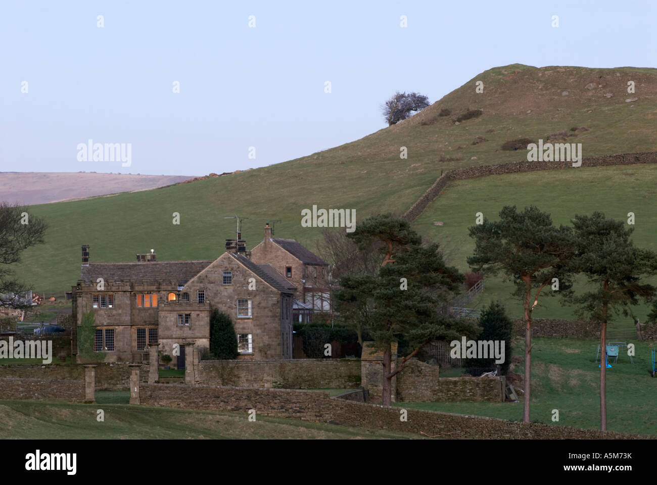 "High Low" and Highlow Hall after sunset the most haunted property in England near Abney  in Derbyshire "Great Britain" Stock Photo