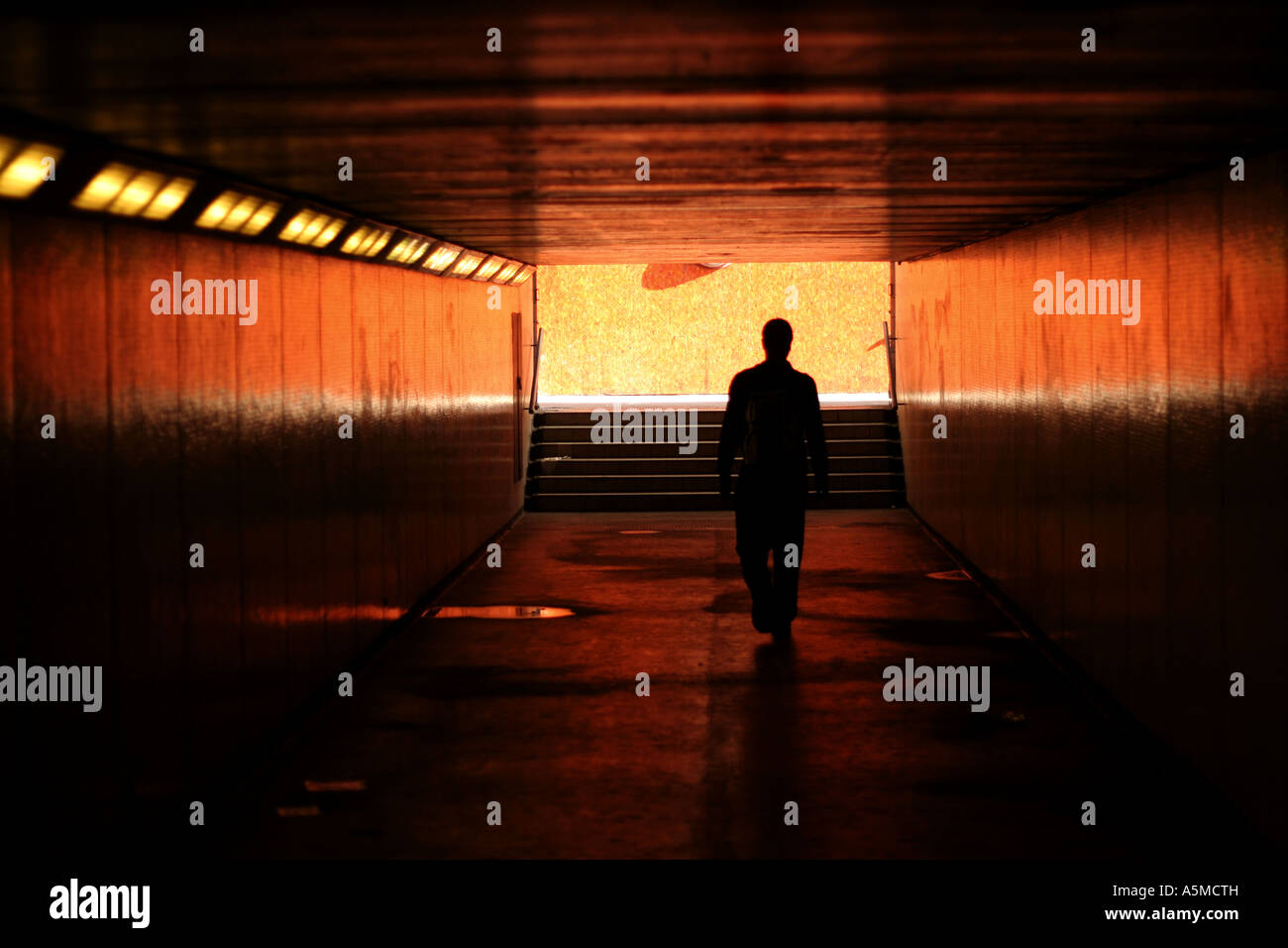 Silhouette of man walking in the subway near Baker street station ...