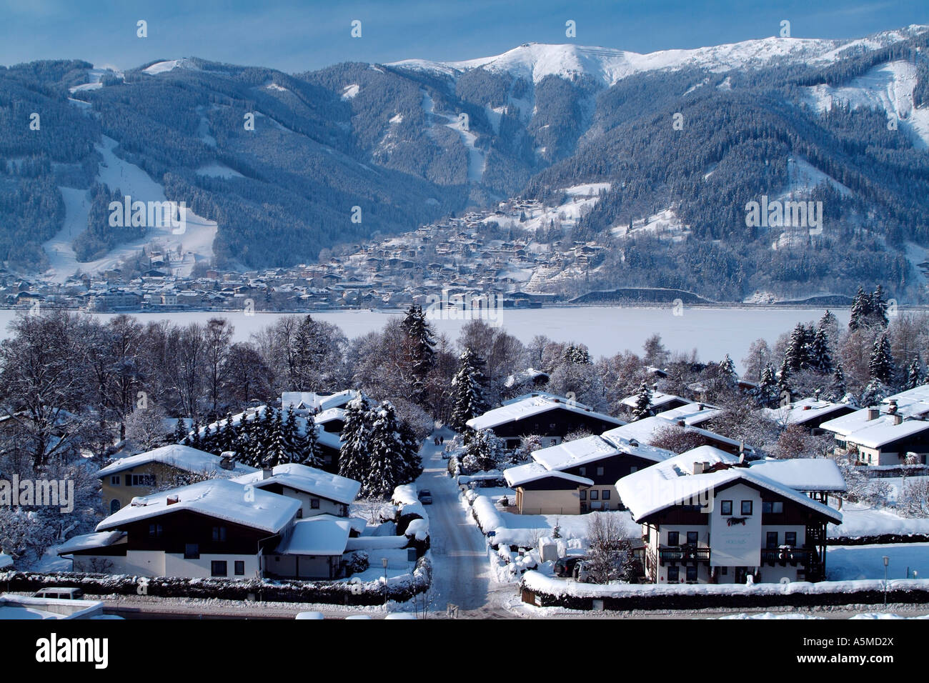 Village of Thumersbach with distant view of Zell am See Austria Stock Photo