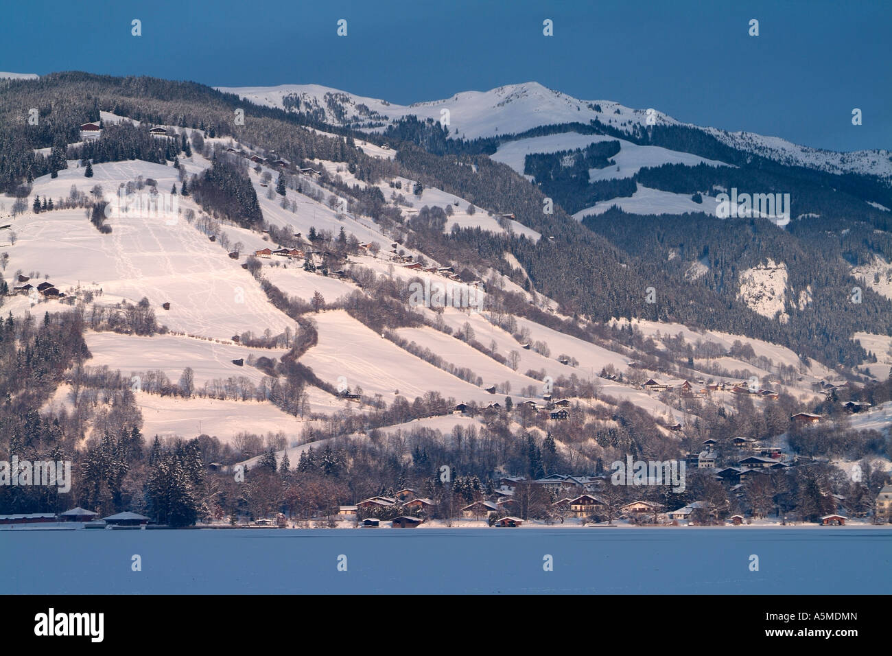 Village of Thumersbach across Zellar See Austria Stock Photo