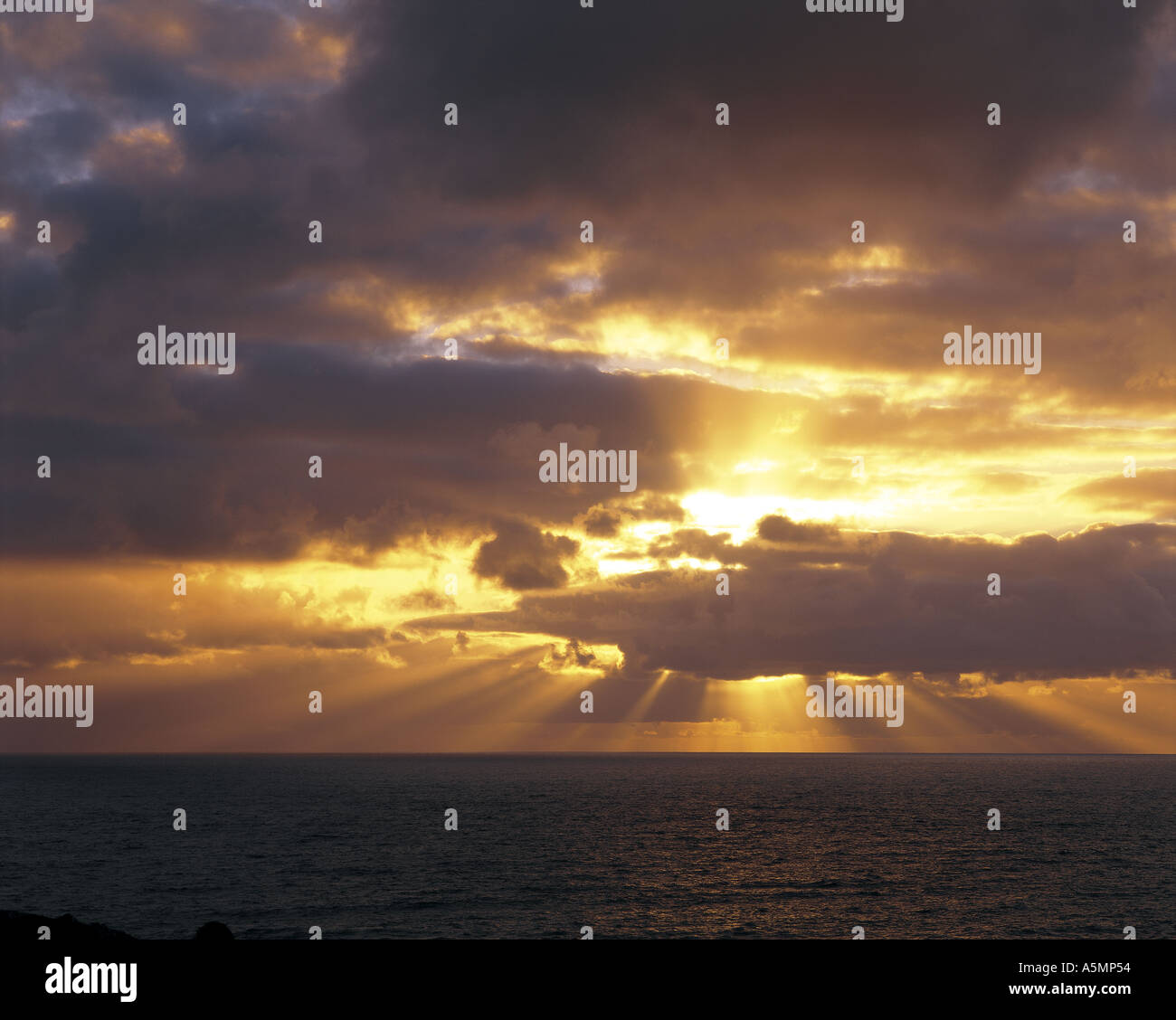 sunrise over ocean Stock Photo - Alamy