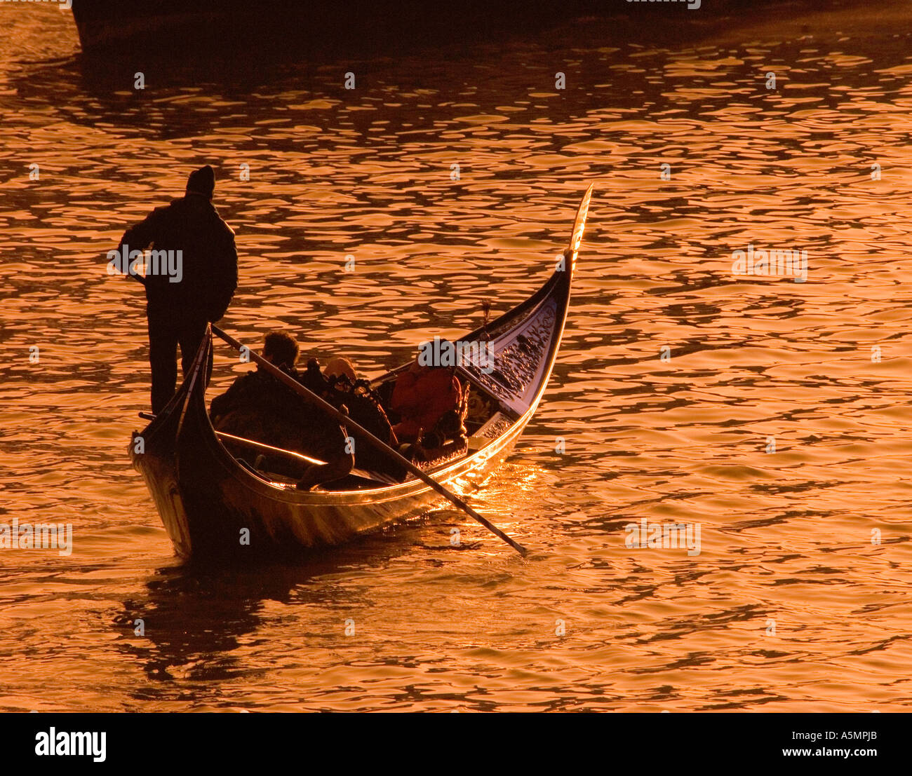Sunset gondola ride venice hi-res stock photography and images - Alamy