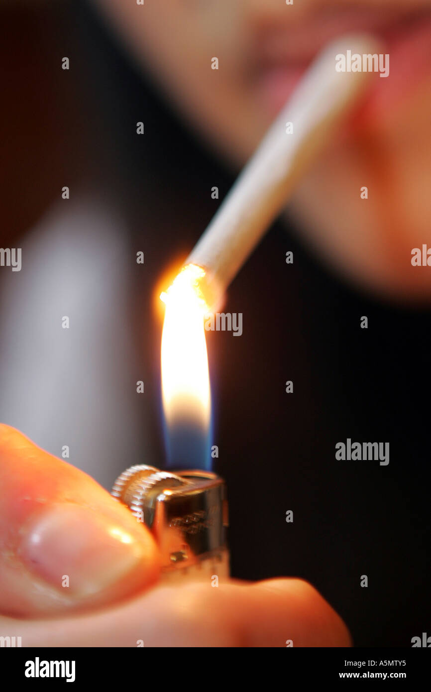 Lighting cigarette hires stock photography and images Alamy