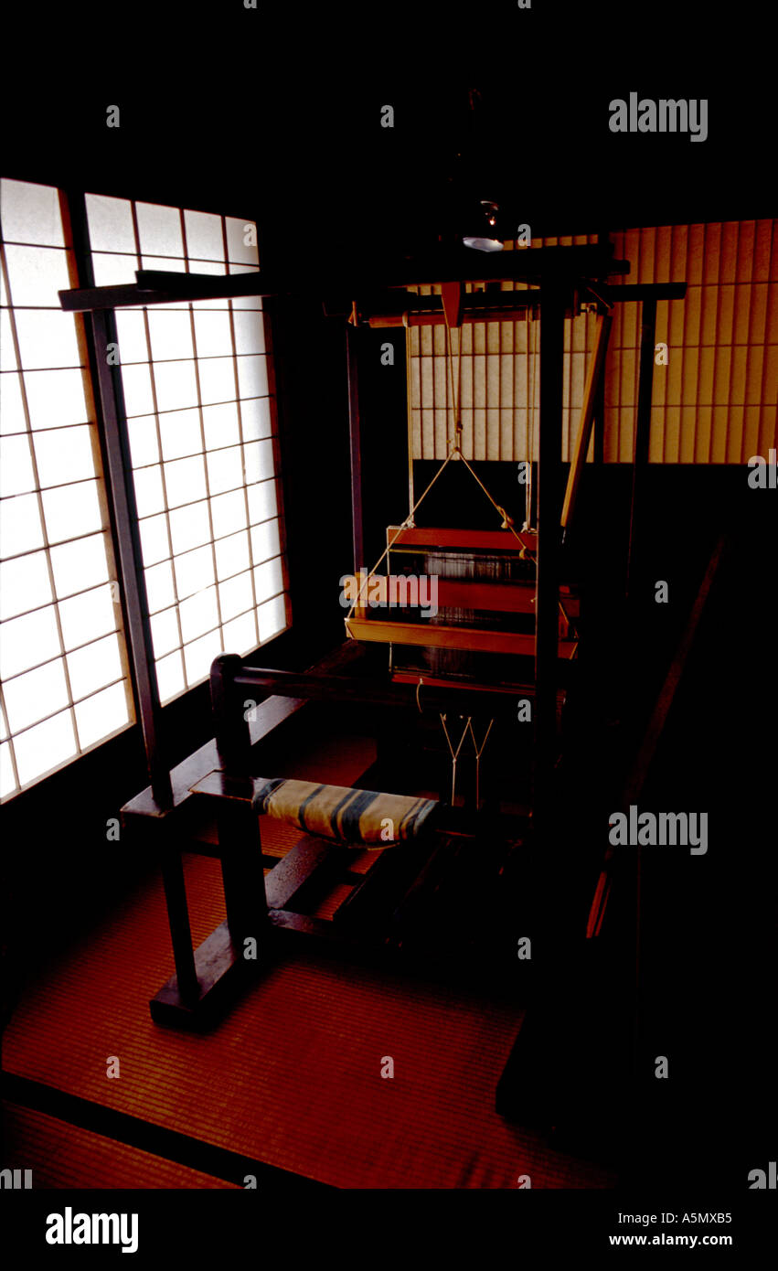 An ancient antique loom in a restore country home at the Hida Folk Village a traditional house open air museum in Takayama Stock Photo