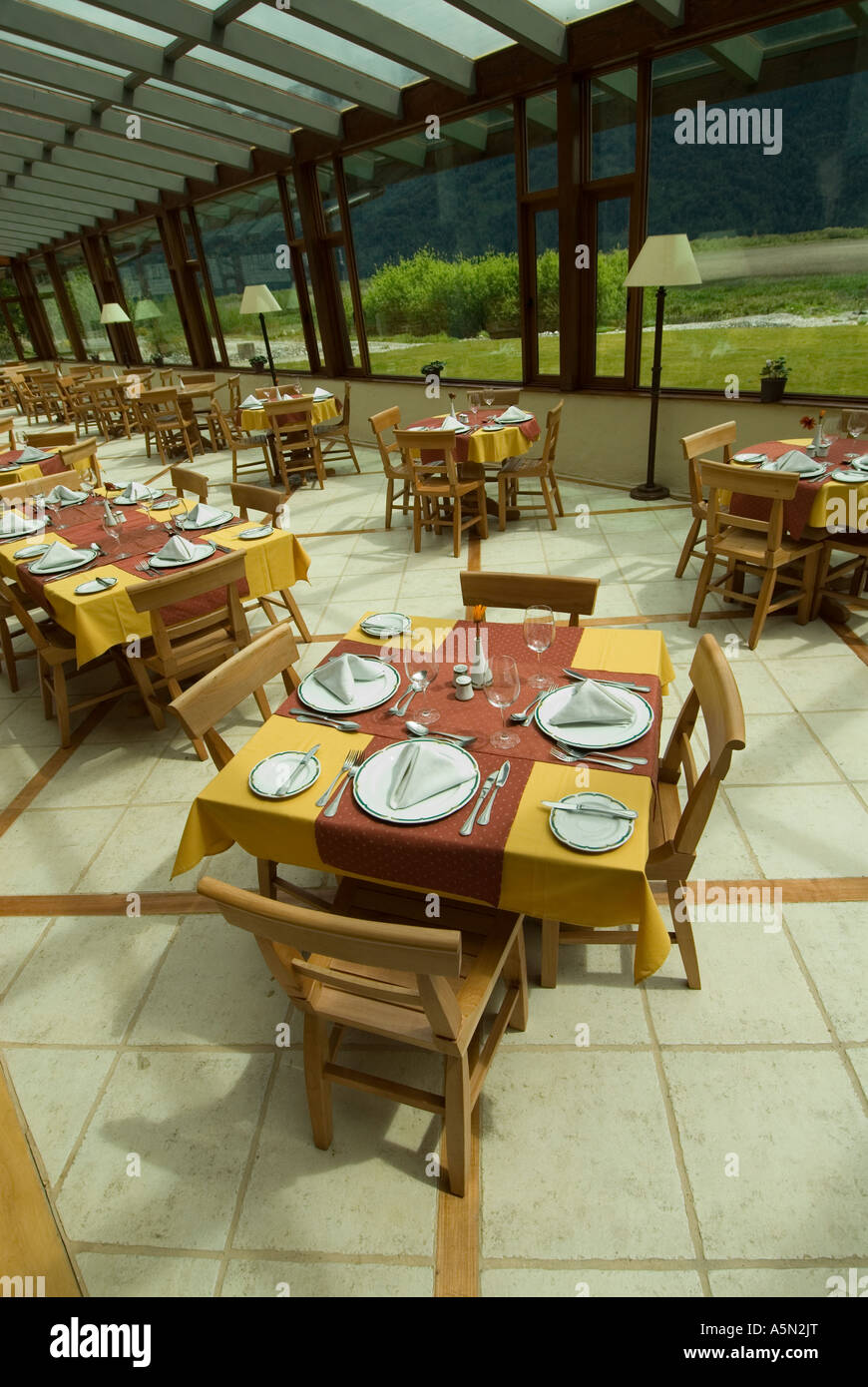 Chile Lake Country Hotel Natura in Peulla scene of fine dining and luxury lodging Hotel dining room Stock Photo