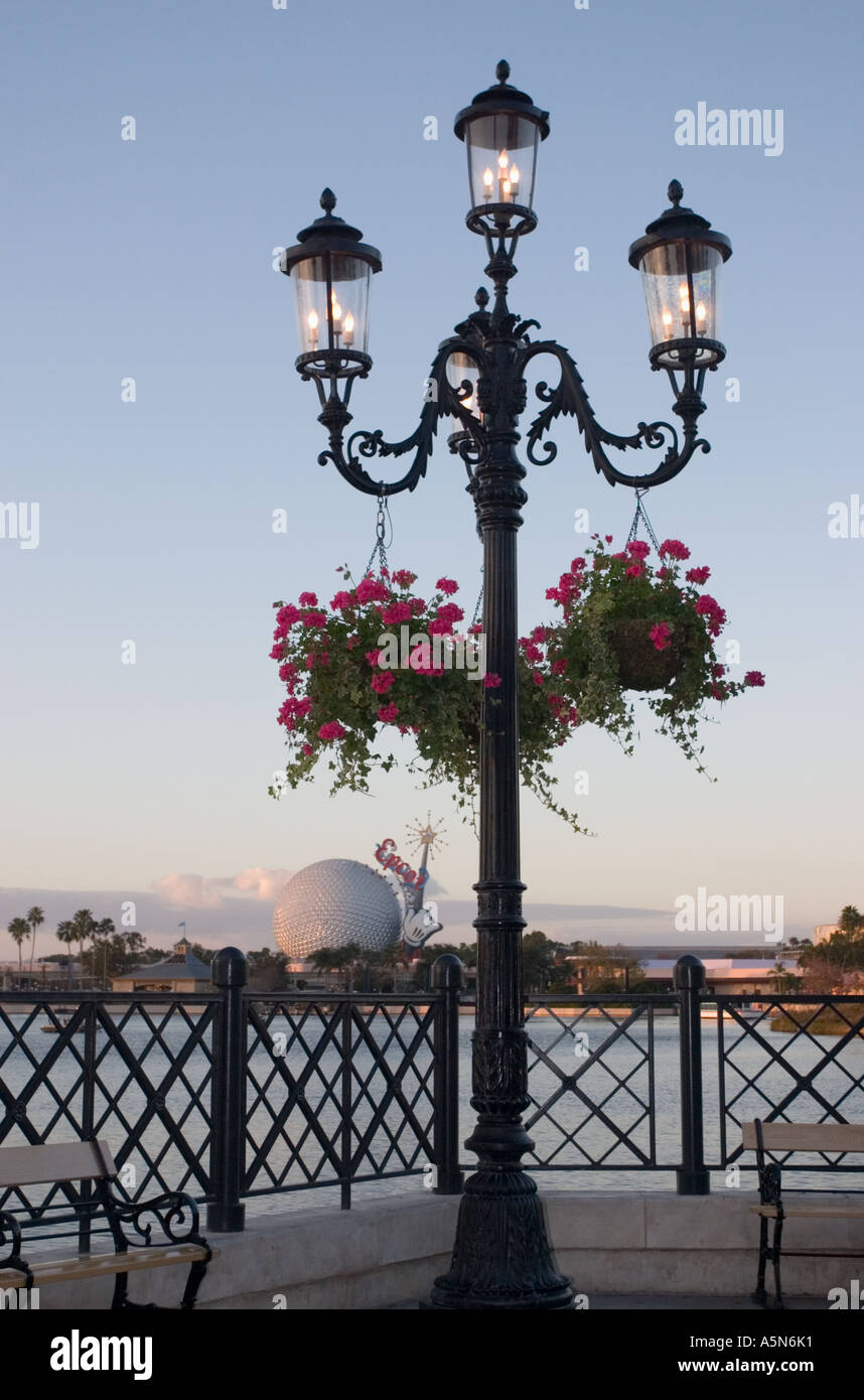 Lamppost with hanging flower baskets facing World Showcase Lagoon Epcot  Walt Disney World Orlando Florida Stock Photo - Alamy