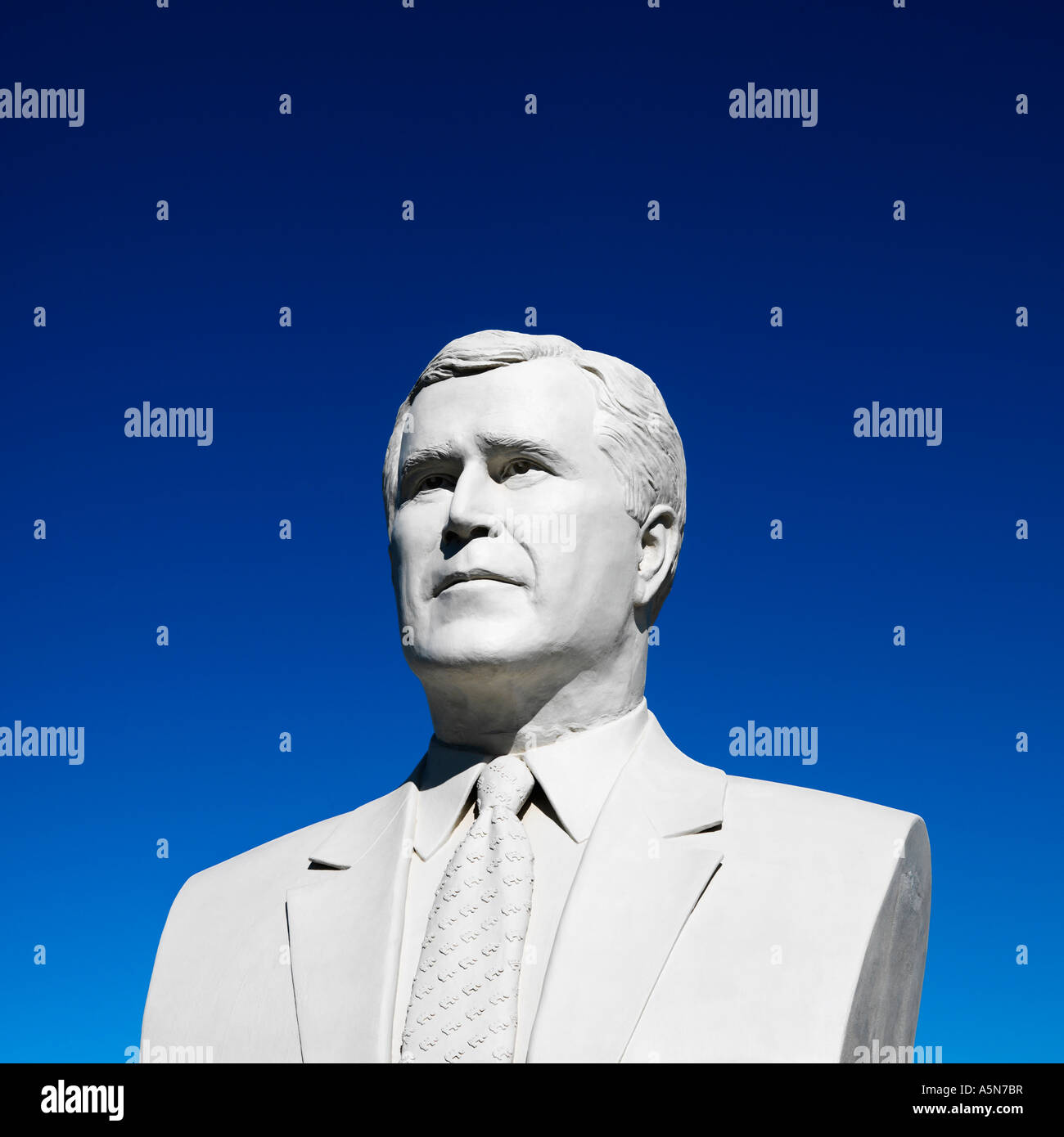 Bust of George Bush sculpture against blue sky in President s Park Black Hills South Dakota Stock Photo