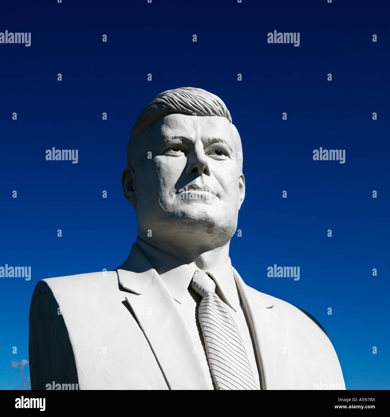 Bust of John F Kennedy sculpture against blue sky in President s Park Black Hills South Dakota Stock Photo