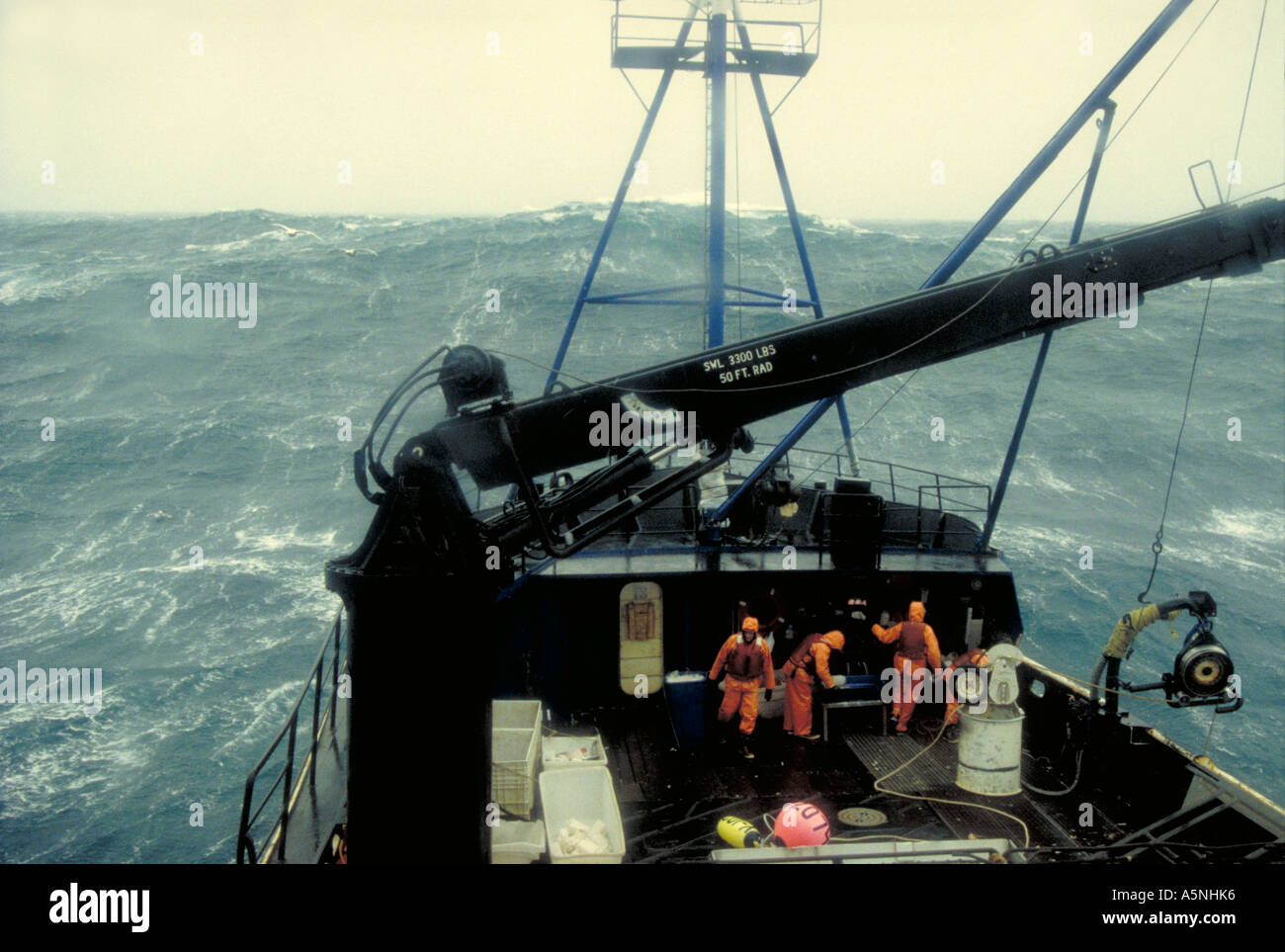 Alaska Bering Sea Crab fishermen work in 40 foot seas and dangerous