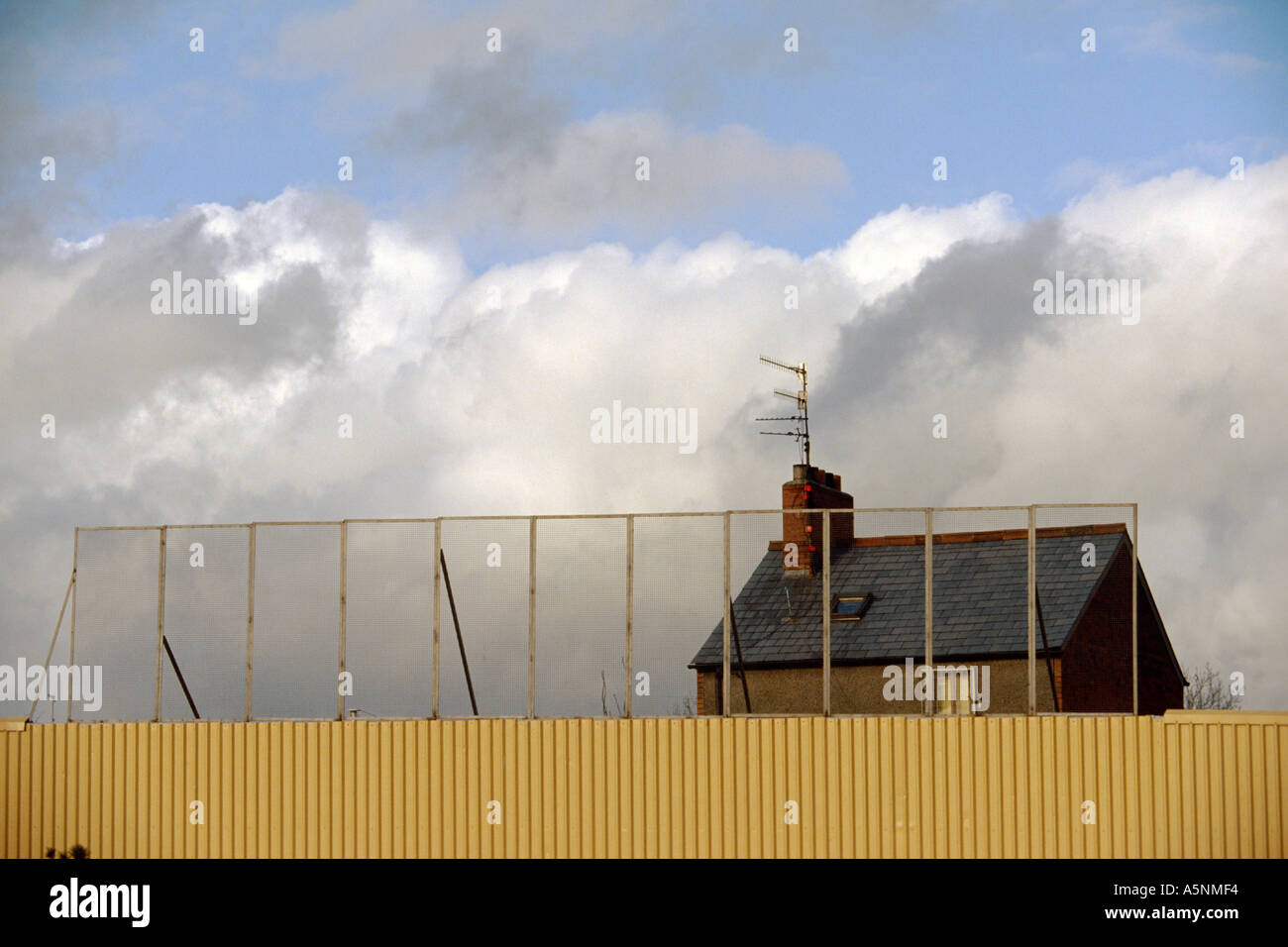 A 'Peace Wall' separates nationalist catholic and protestant loyalist areas of Belfast. Stock Photo