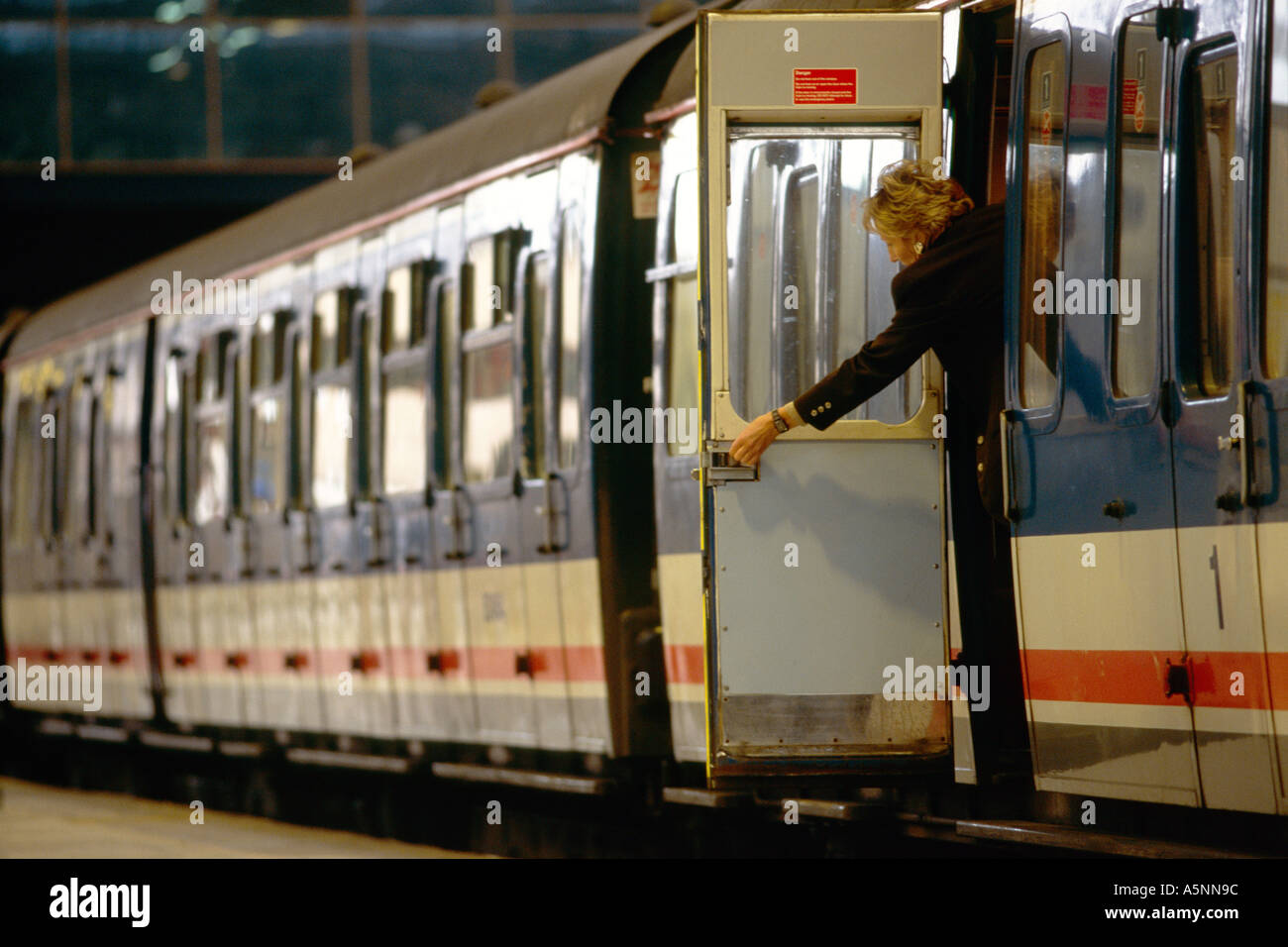 Passenger closing train door Stock Photo 3707291 Alamy