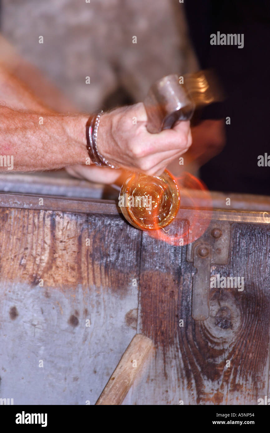 A skilled craftsman demonstrates traditional glass Blowing in Venice