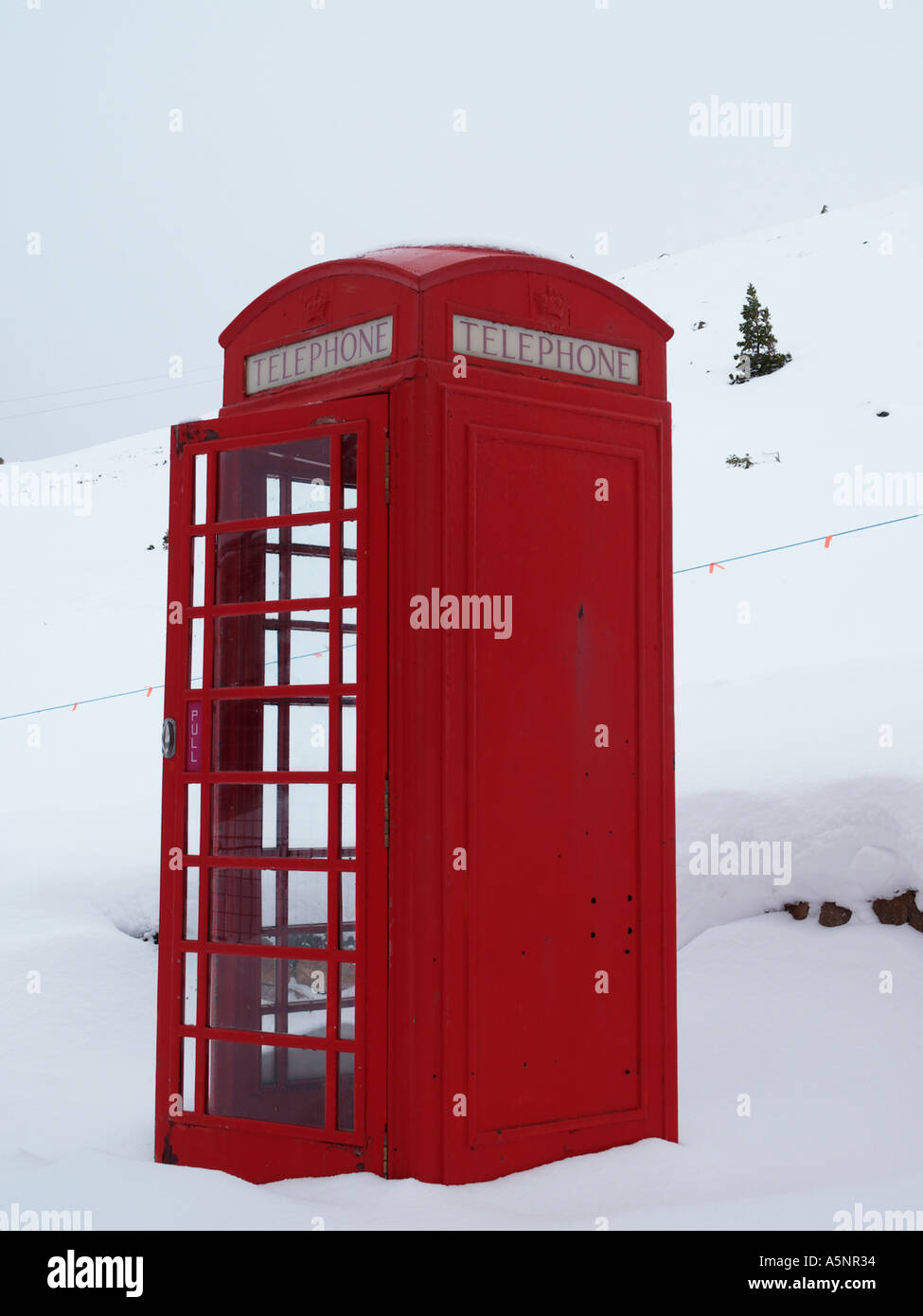 Red Telephone Box K6 With Door Open In Deep Mid Winter Snow