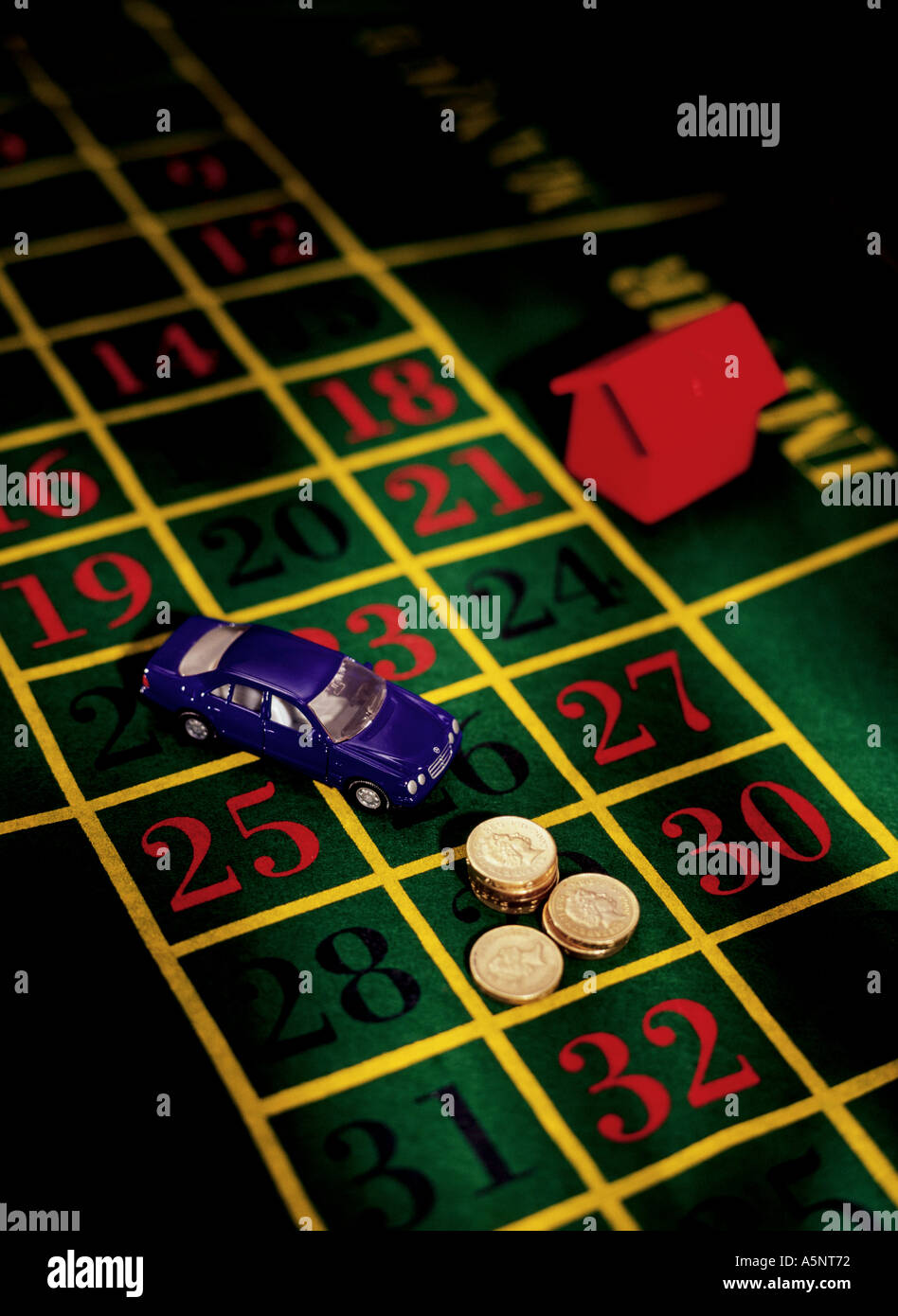 Gambling money cars and property Stock Photo