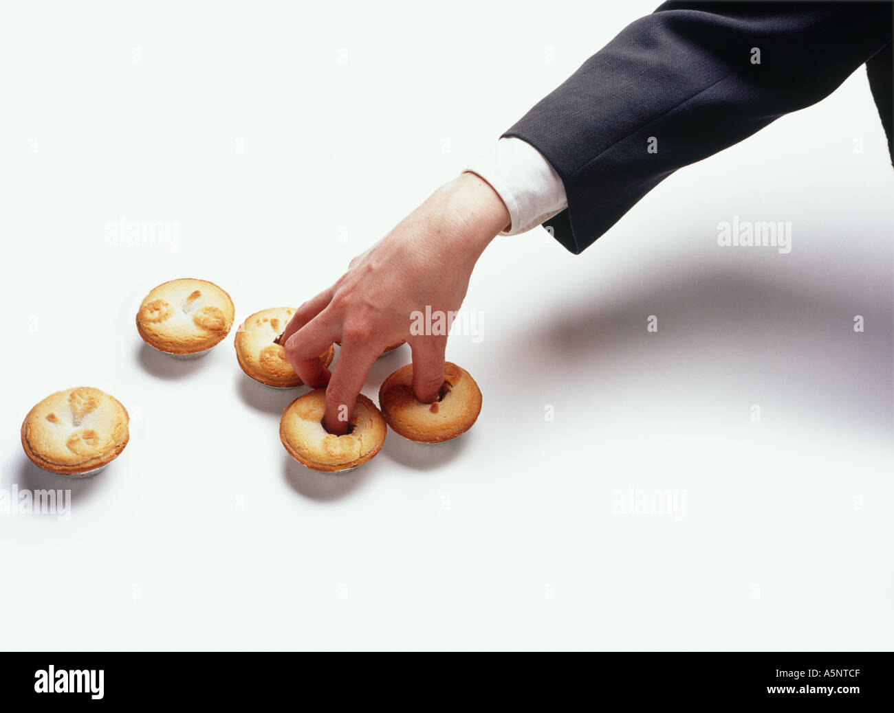 Fingers in pies Stock Photo Alamy
