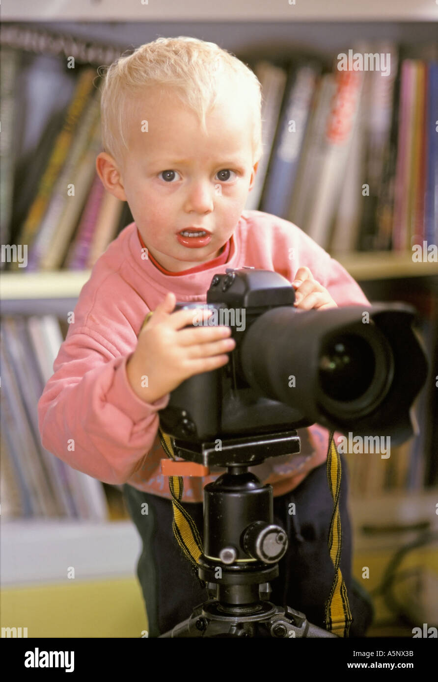 little 1 5 year old boy is taking photographes Stock Photo Alamy