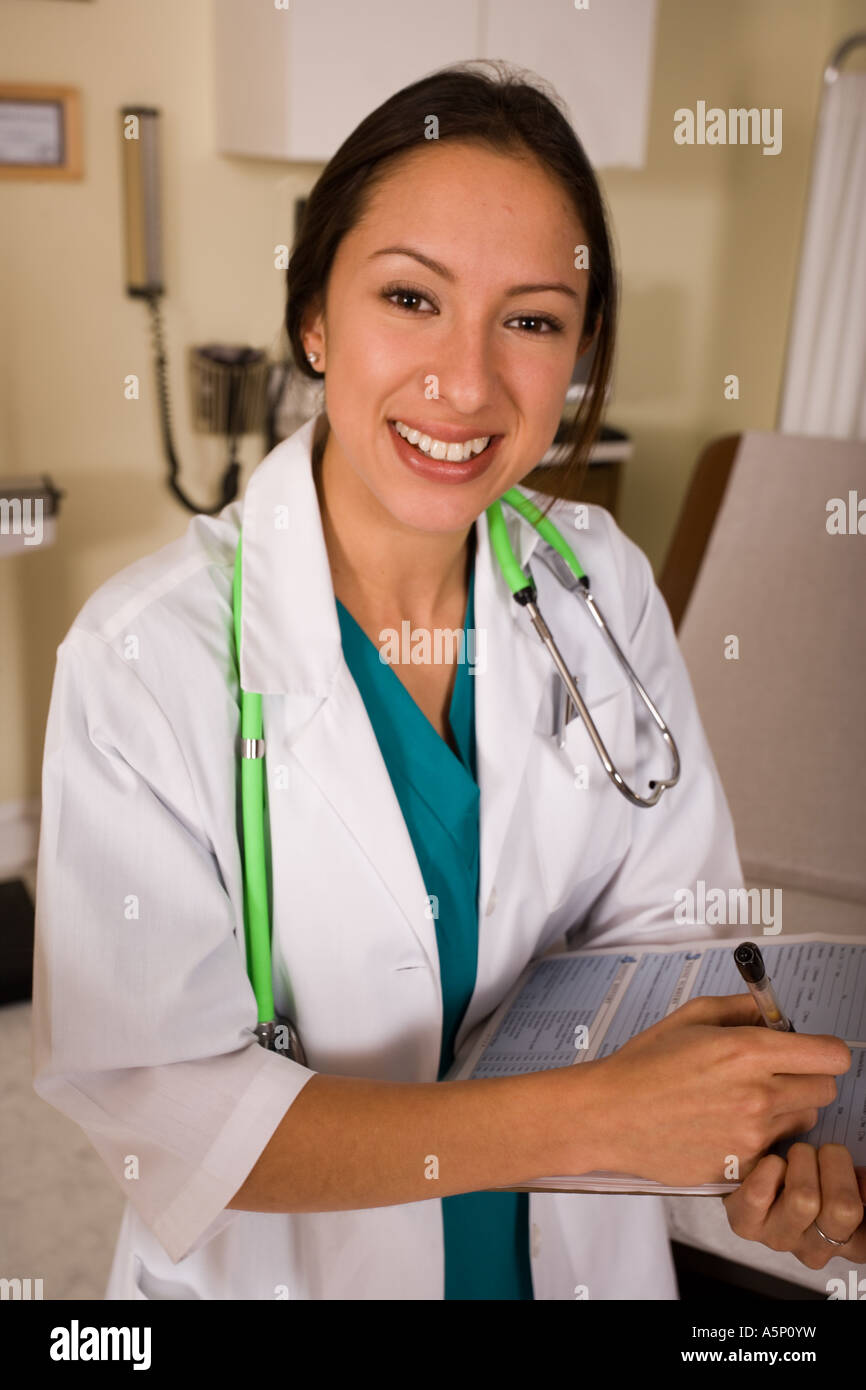 Hispanic female doctor in doctors office or clinic Stock Photo Alamy