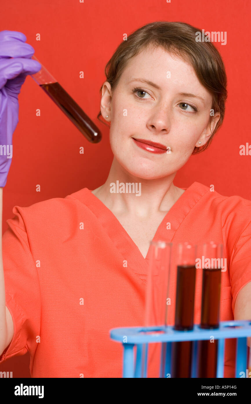 Researcher testing oil products or blood samples. Stock Photo