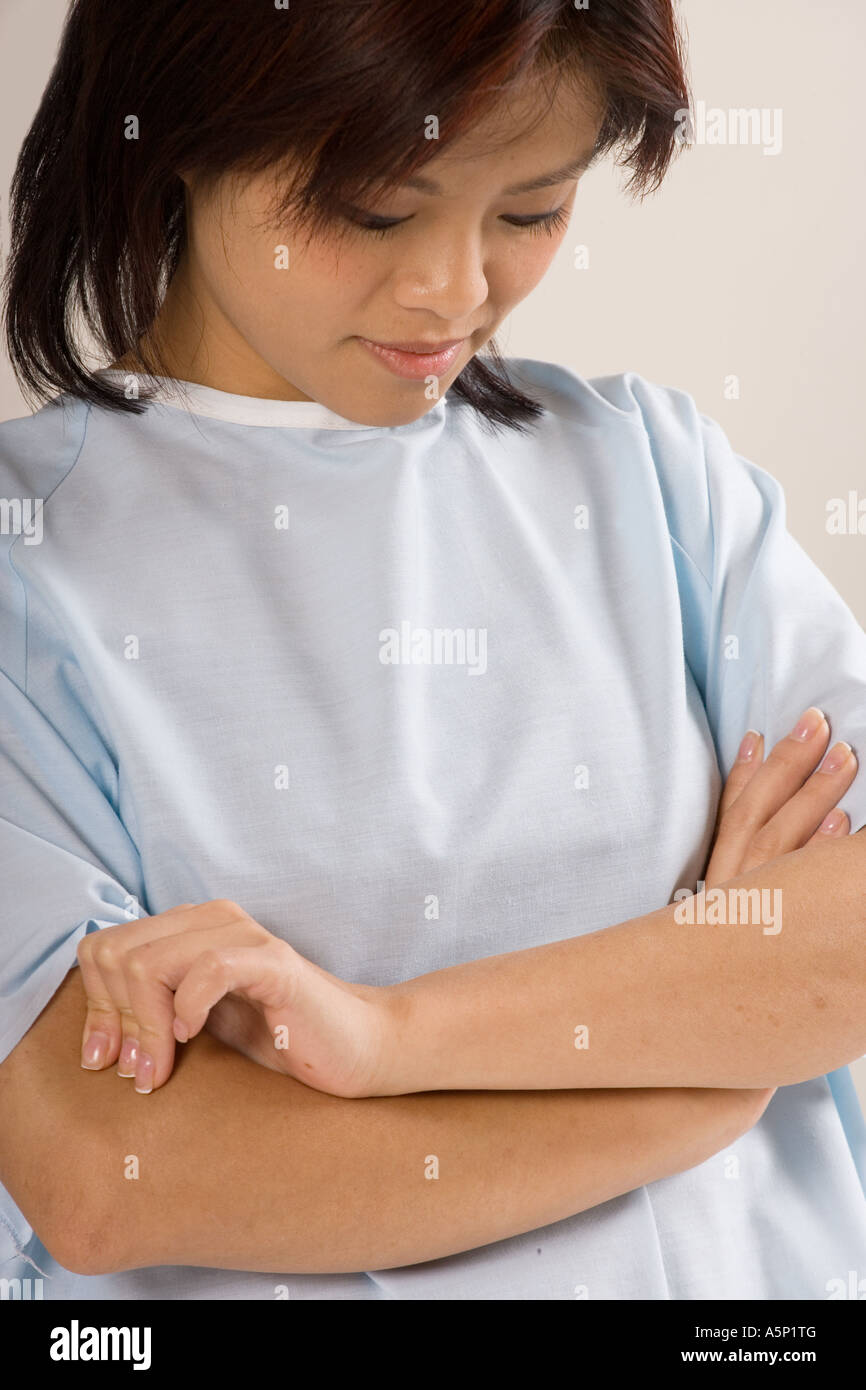 Woman hospital gown waiting hi-res stock photography and images - Alamy