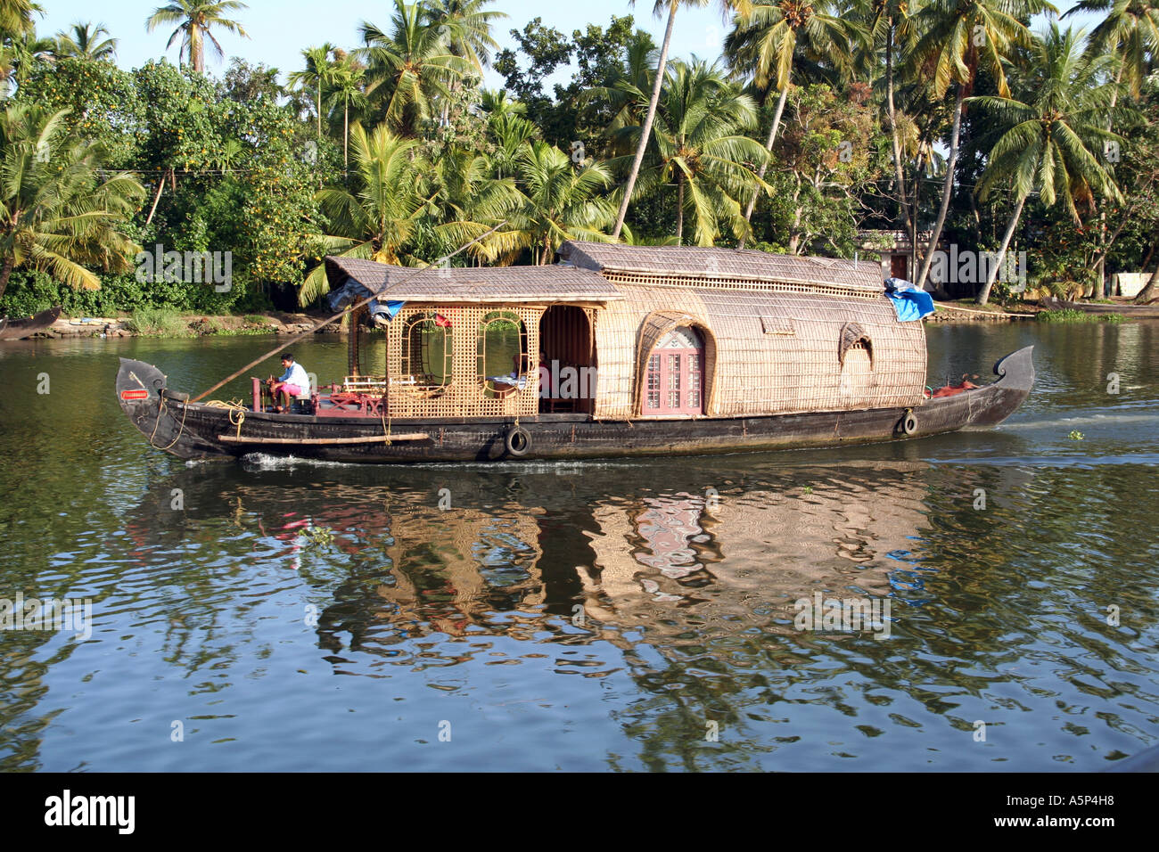 A traditional Houseboat on the backwaters of Kerala Stock Photo