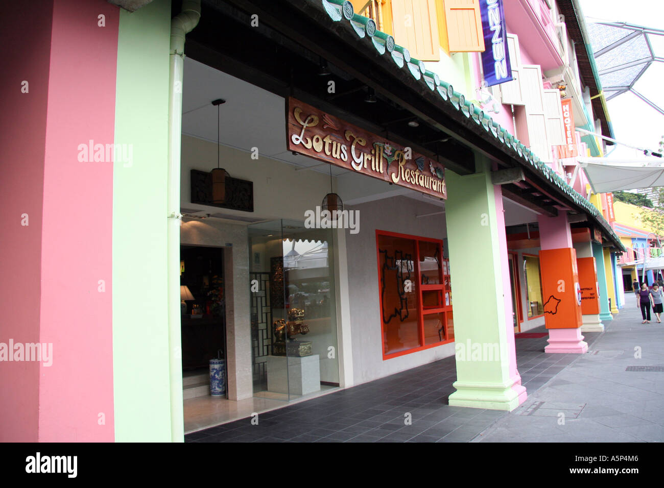 Lotus Grill restaurant with hooters bar nextdoor, Clarke Quay district singapore Stock Photo