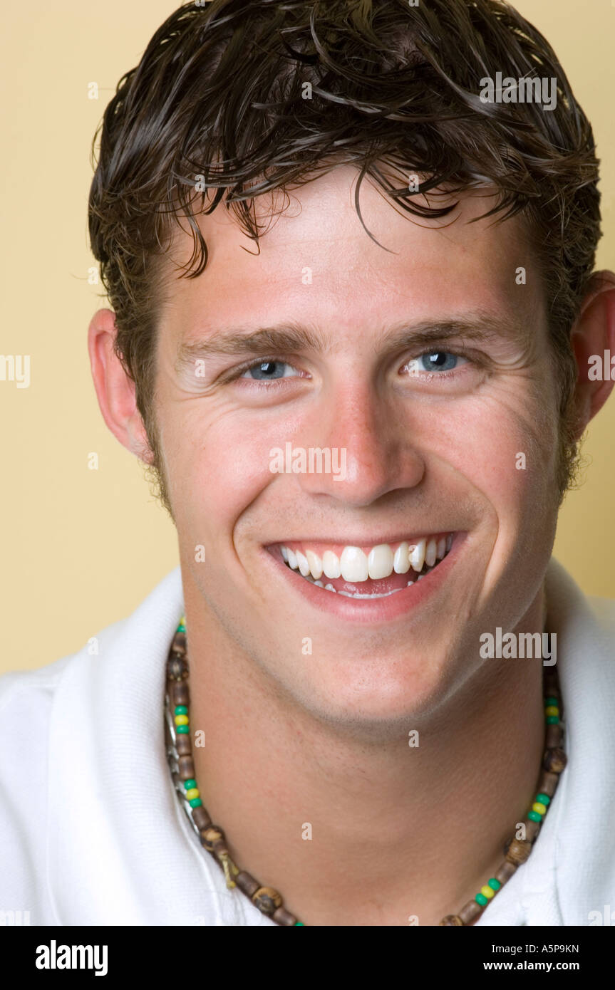 Teenage boy smiling at camera Stock Photo - Alamy