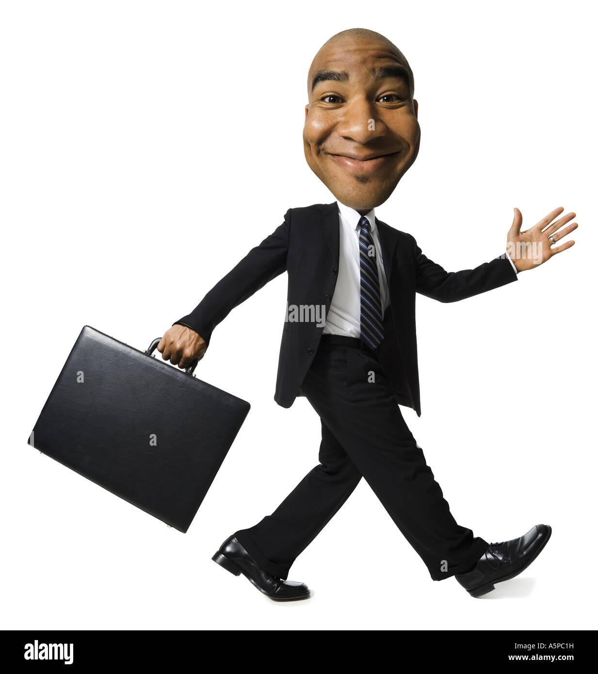 Businessman walking with briefcase Stock Photo - Alamy