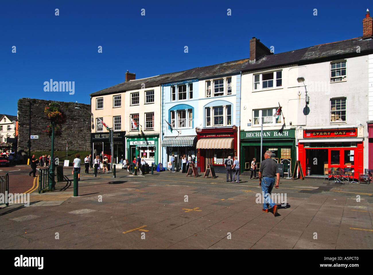 Caernarfon Square with row of small shops with accommodation above Stock Photo