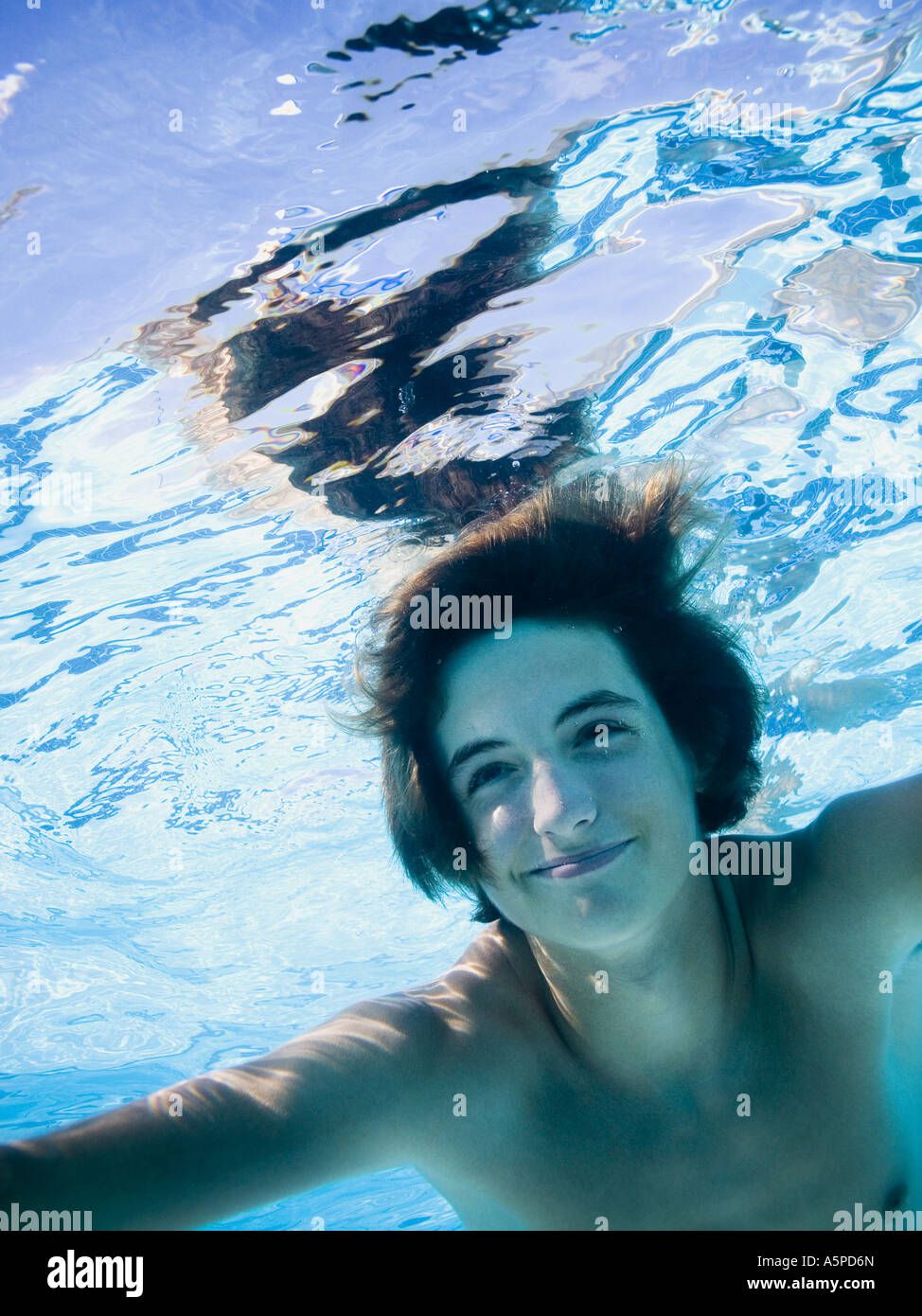 Boys swimming underwater happy hi-res stock photography and images - Alamy