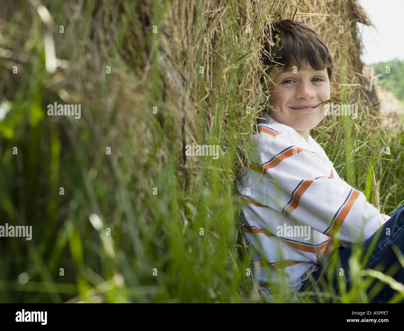 Portrait of a boy smiling Stock Photo - Alamy