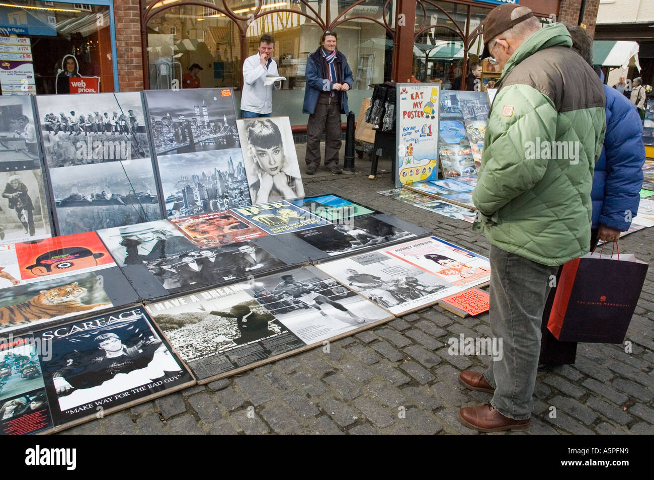 Posters for sale in a street market Stock Photo