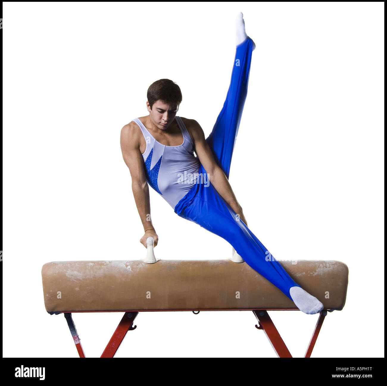 Male gymnast performing routines on vaulting horse Stock Photo Alamy