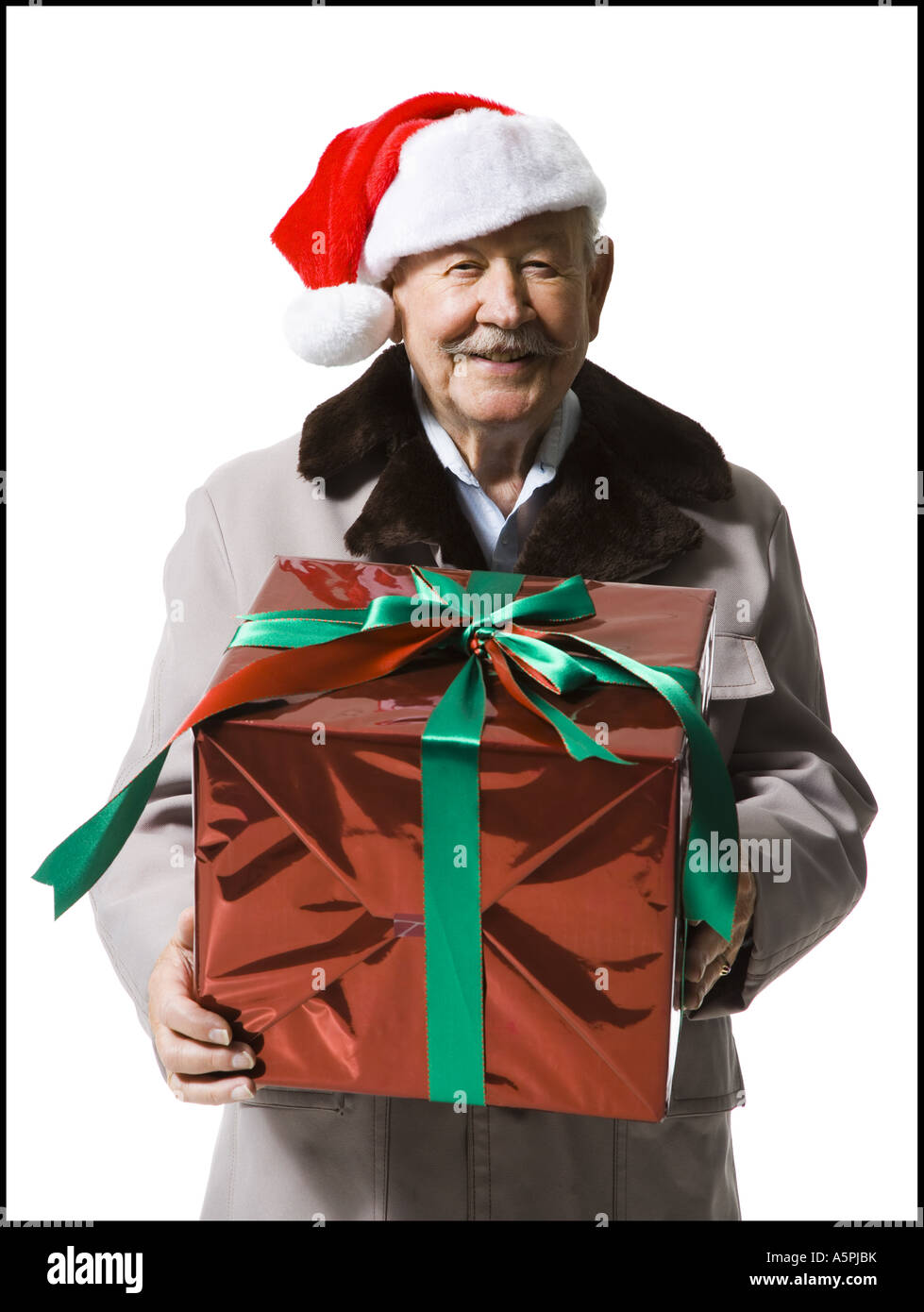 Santa holding present hi-res stock photography and images - Alamy
