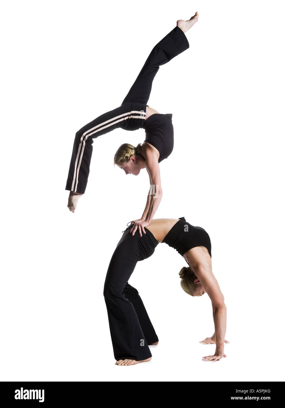 Female contortionist duo performing Stock Photo Alamy