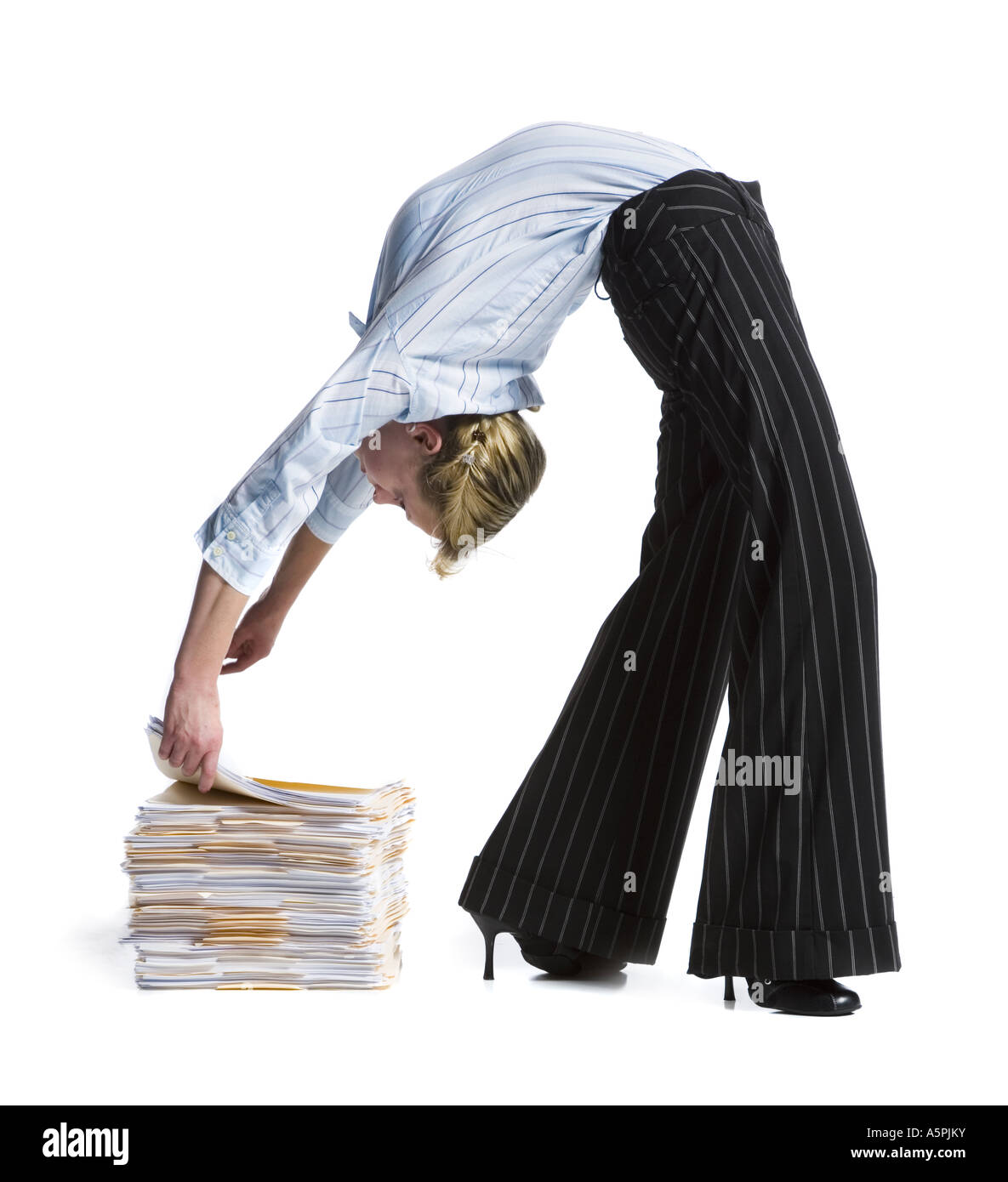 Female Contortionist Businesswoman Bending Over Backwards Stock Photo
