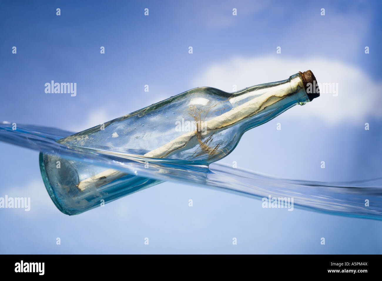 Message in a floating bottle Stock Photo - Alamy