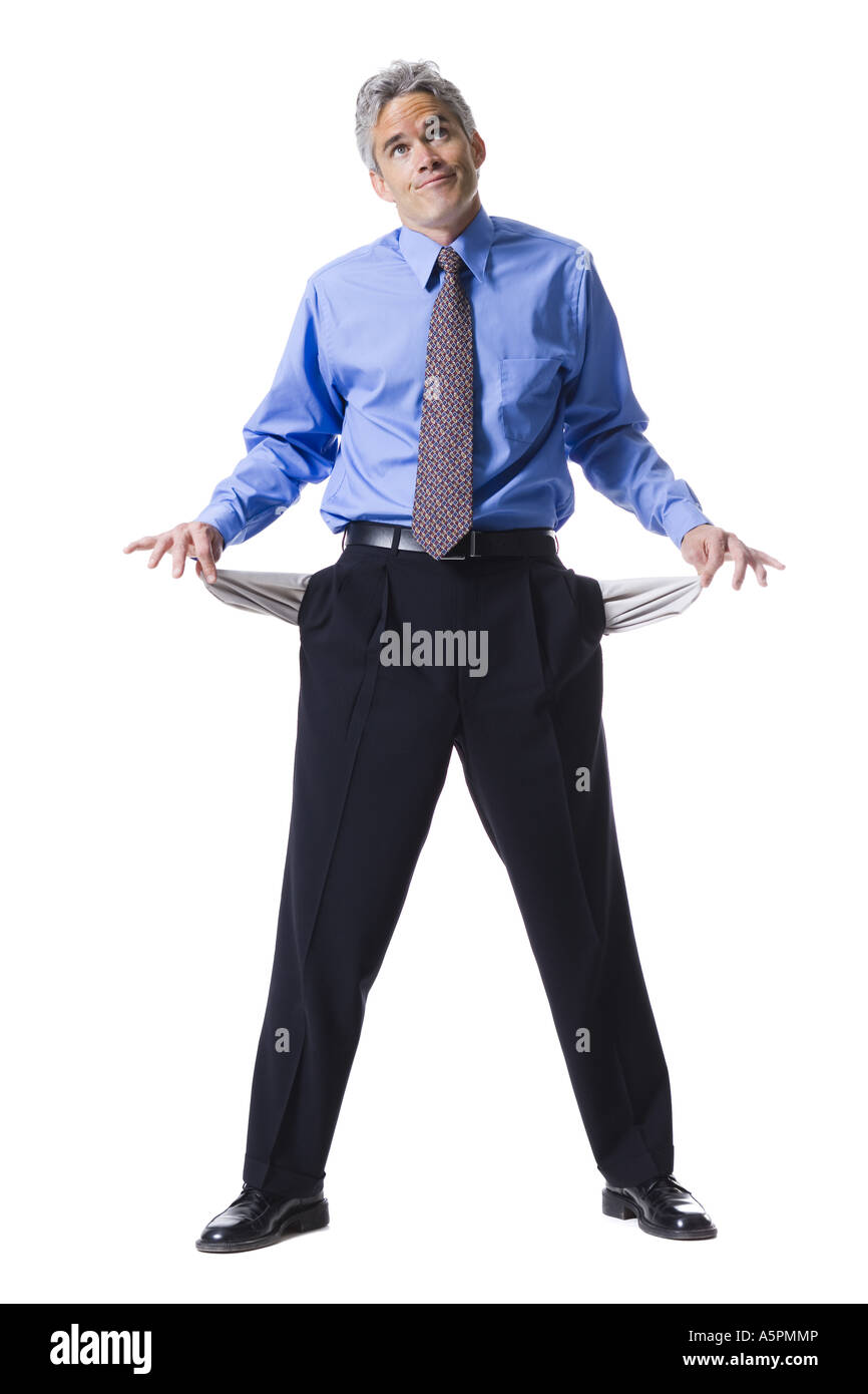 Man with empty pockets inside out Stock Photo Alamy