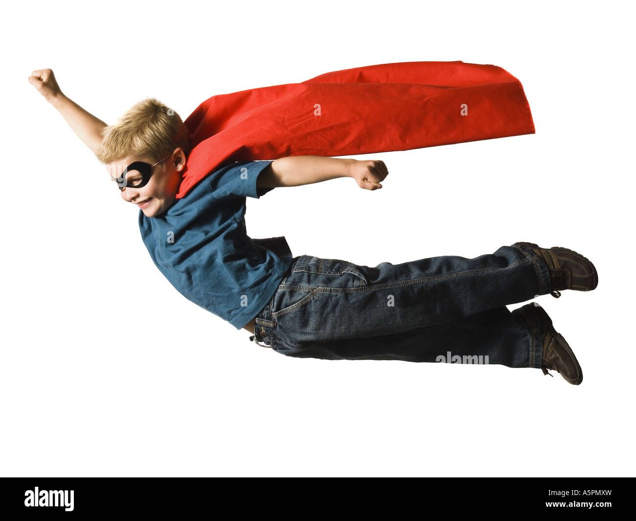 Young boy in superhero costume Stock Photo