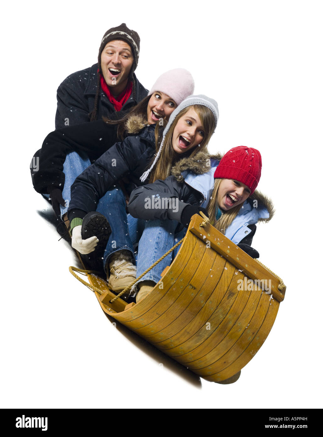 Family on toboggan Stock Photo Alamy