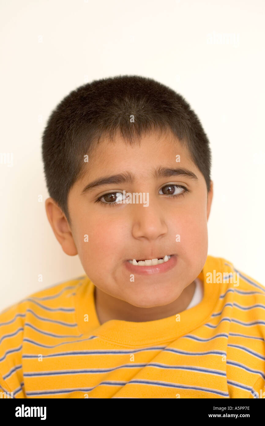 Asian Indian Boy Making Funny Face UK Stock Photo - Alamy
