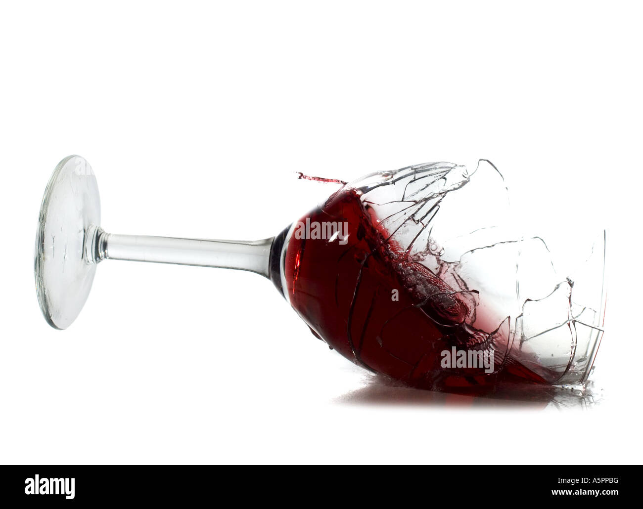 Falling glass of red wine Stock Photo