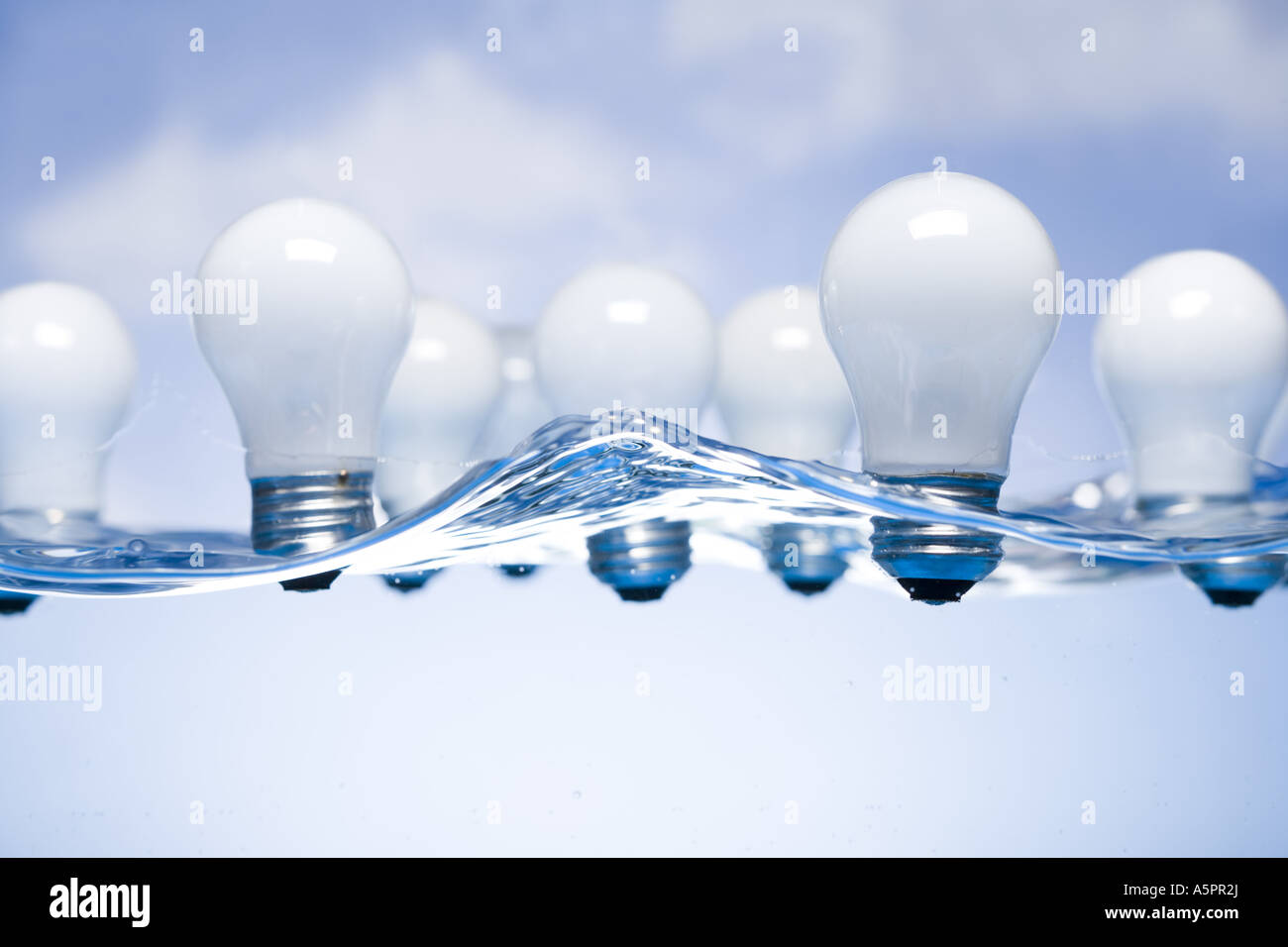 Light bulbs floating in water Stock Photo Alamy