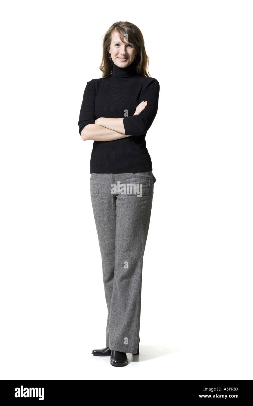 Portrait of a woman standing with her hands on her hips Stock Photo - Alamy