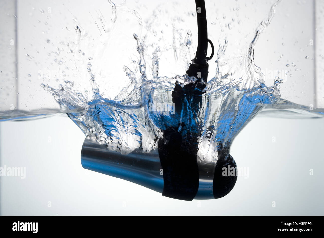 Hair dryer dropped in water Stock Photo Alamy