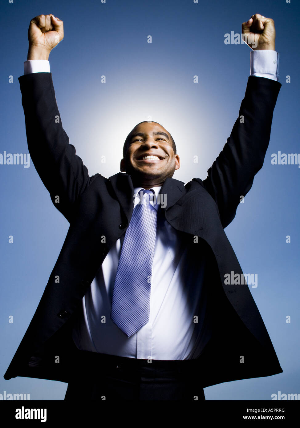 Businessman pumping fists in the air Stock Photo - Alamy
