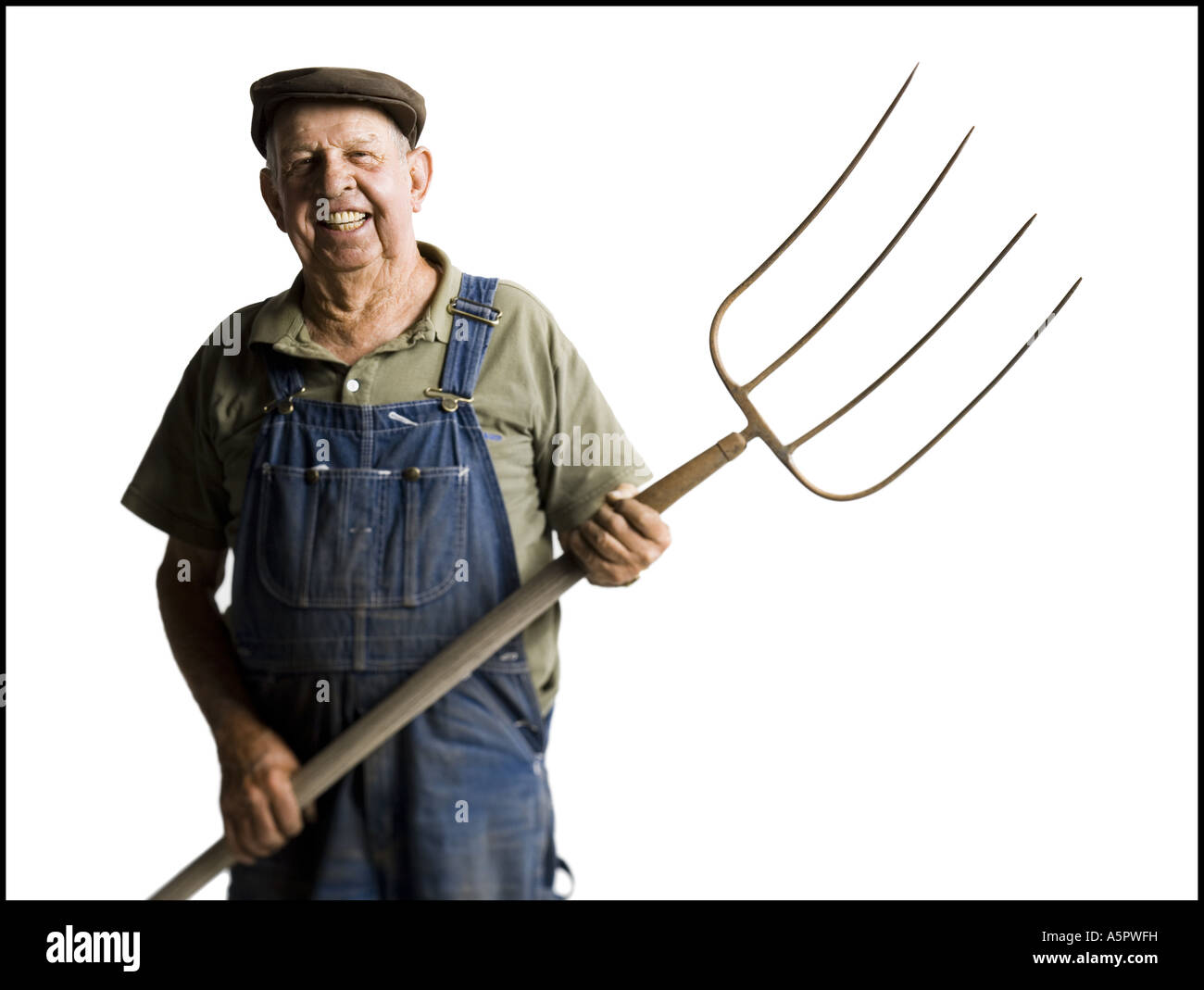 Farmer holding a pitchfork Stock Photo - Alamy