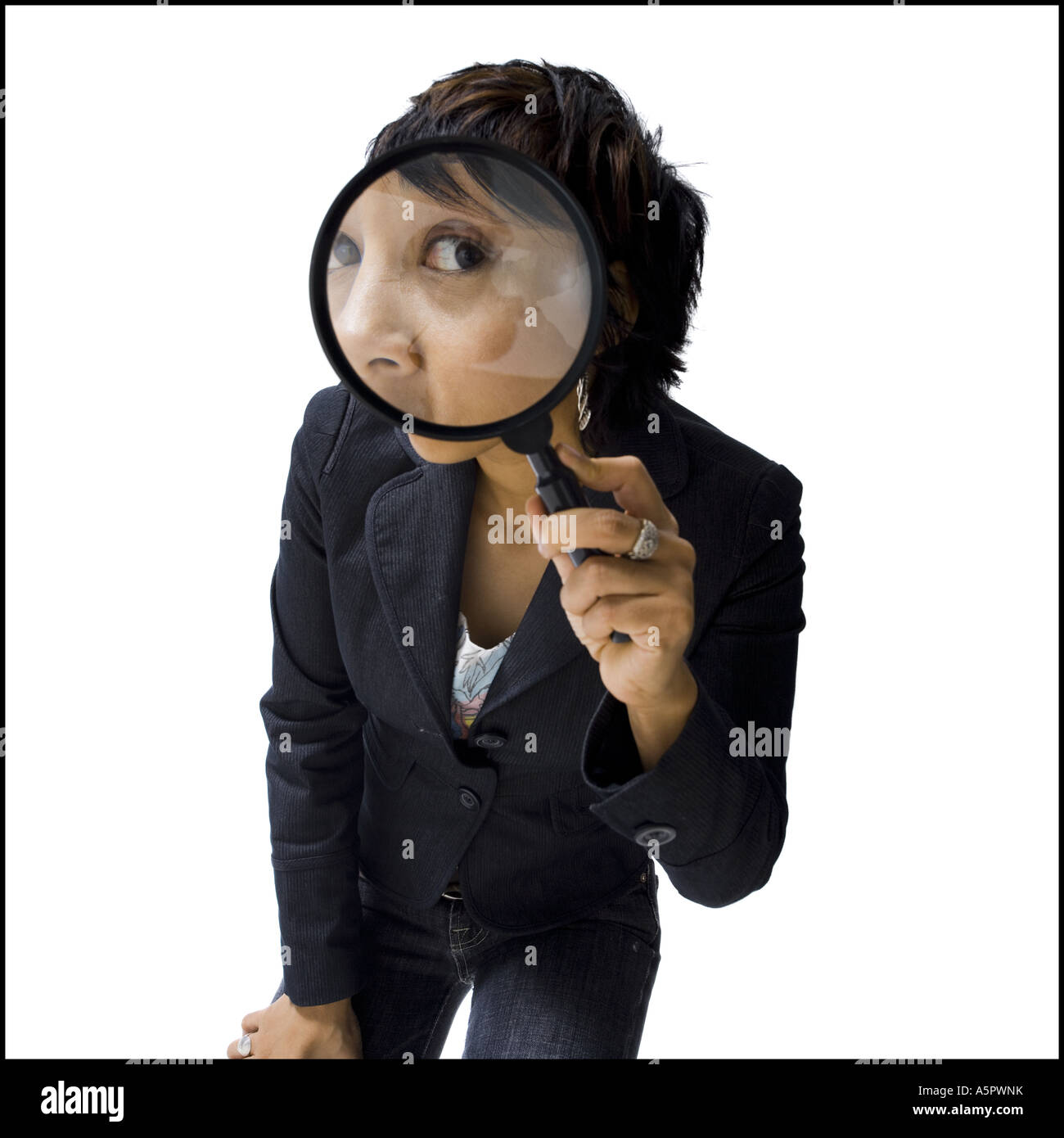 Woman holding and looking through magnifying glass Stock Photo - Alamy