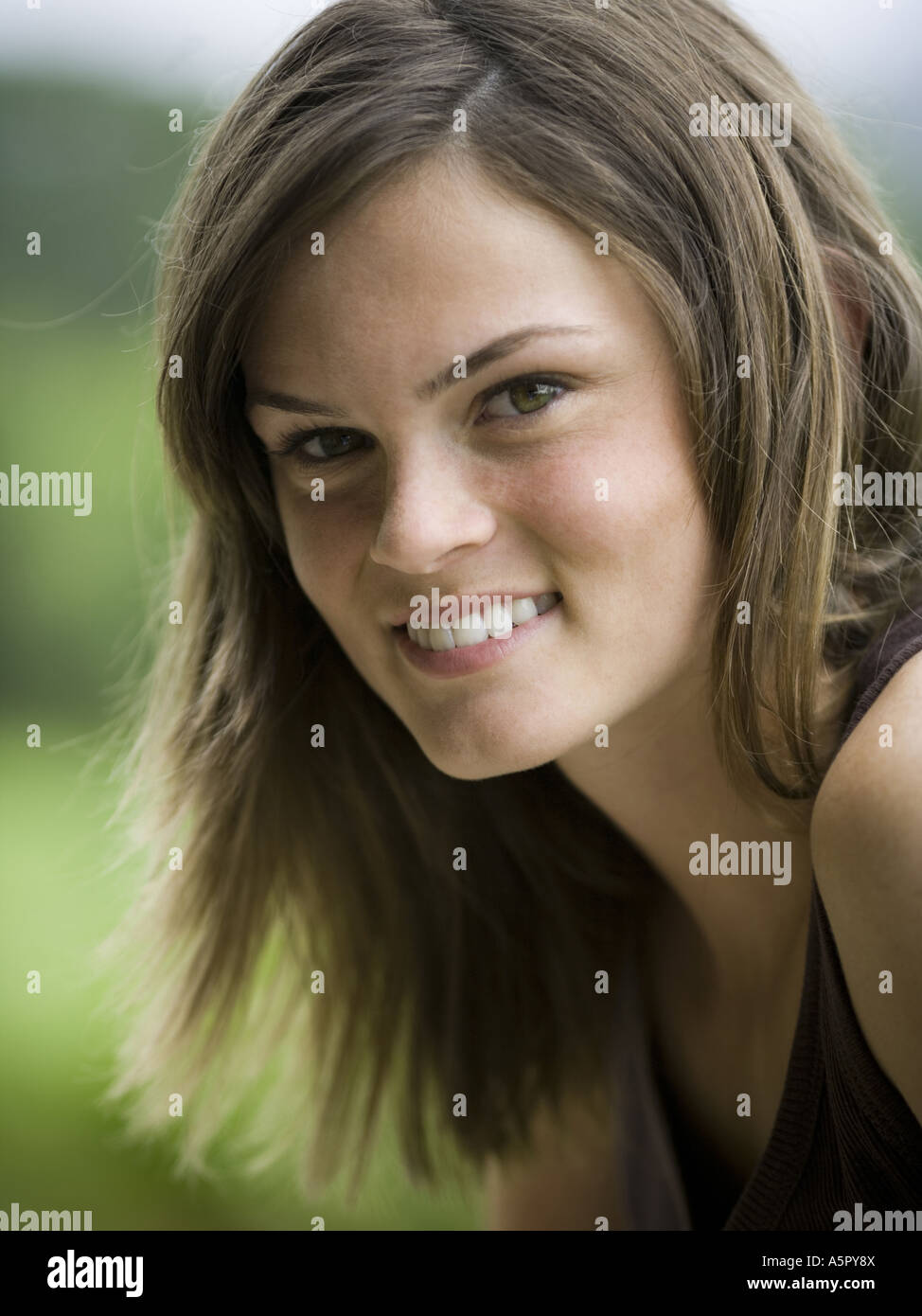 Portrait of a teenage girl smiling Stock Photo - Alamy