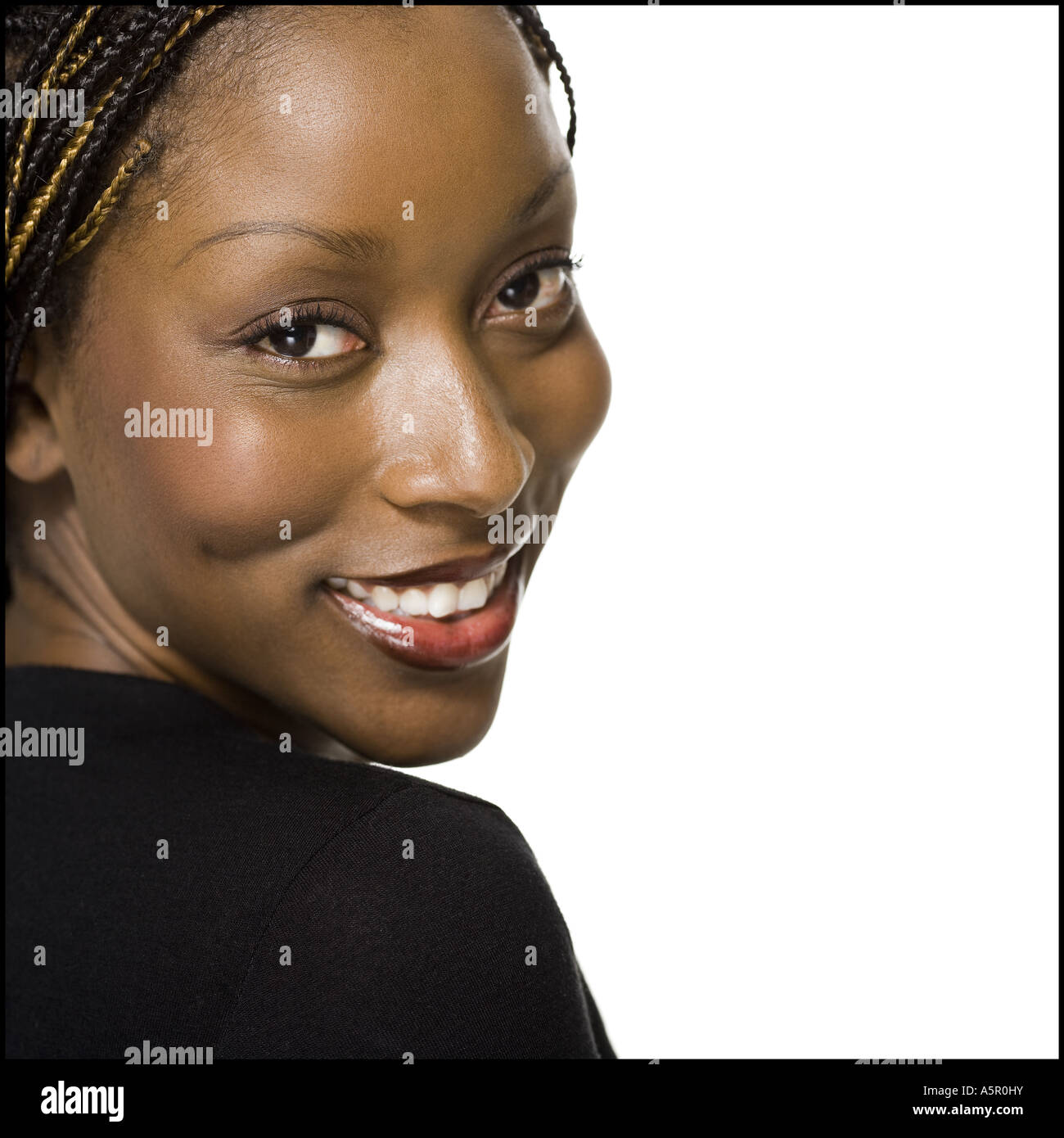 Female with braided hair smiling Stock Photo - Alamy