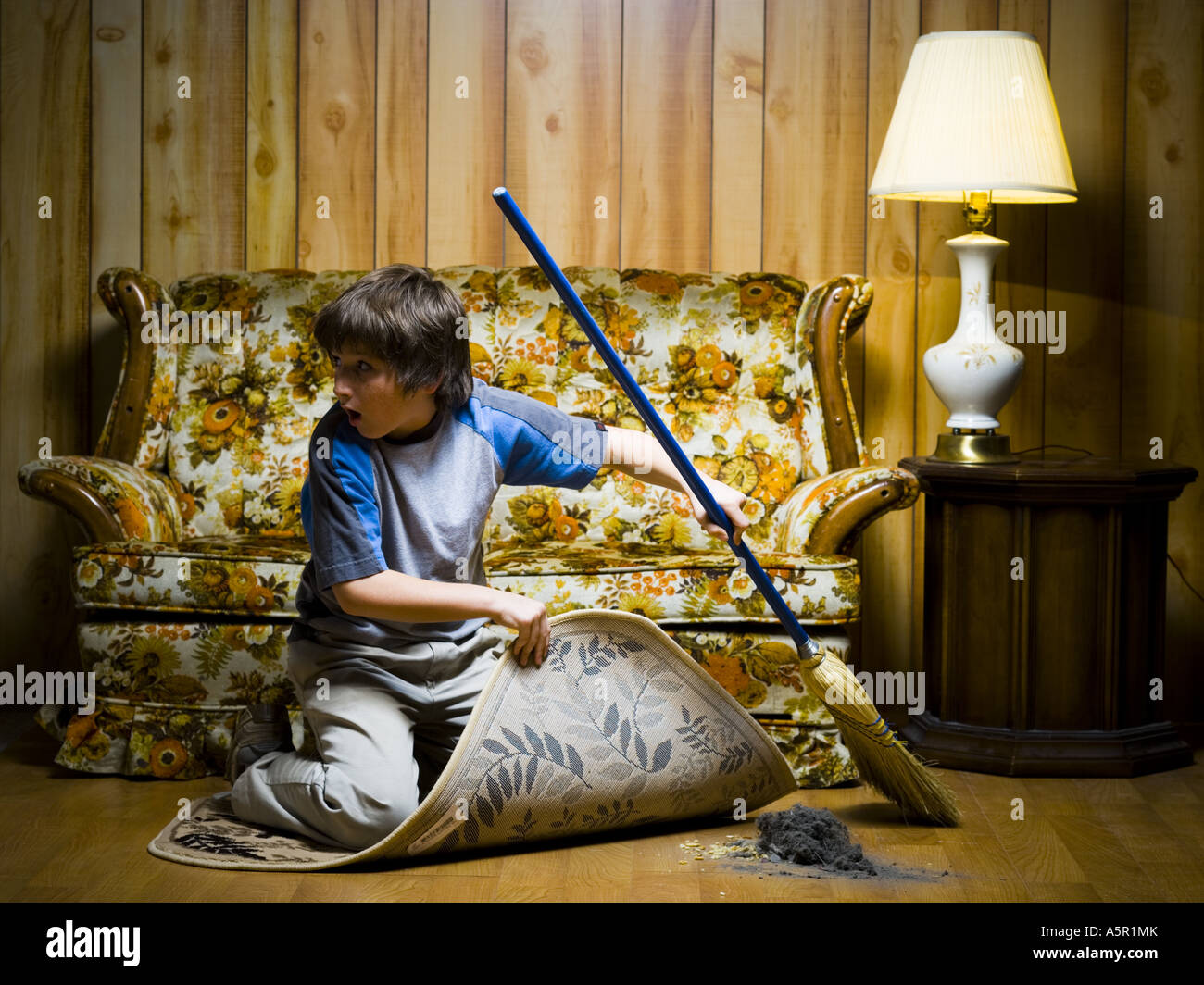 Sweeping under carpet hi-res stock photography and images - Alamy